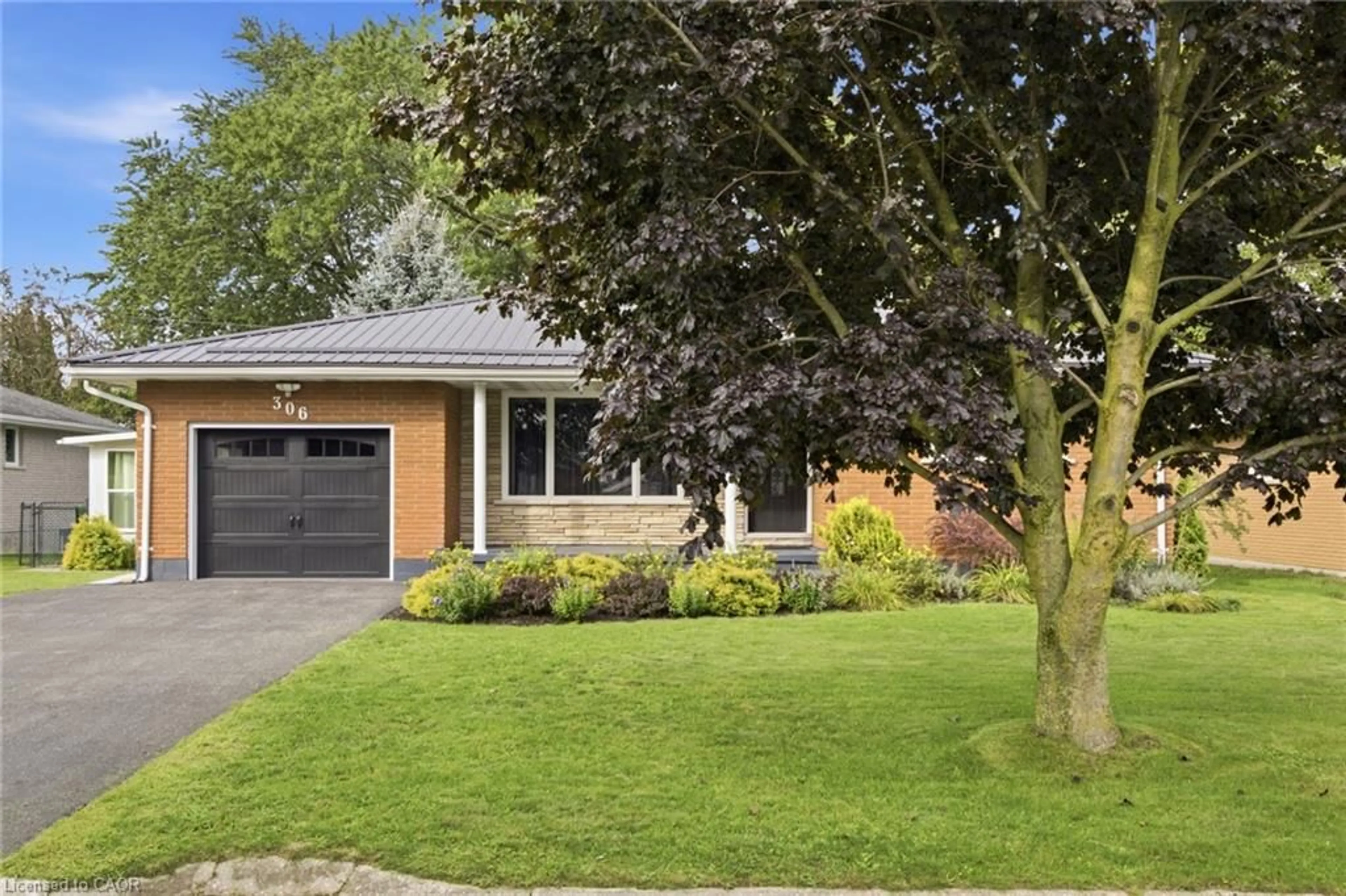 Home with brick exterior material, street for 306 Adams Ave, Delhi Ontario N4B 2Y5