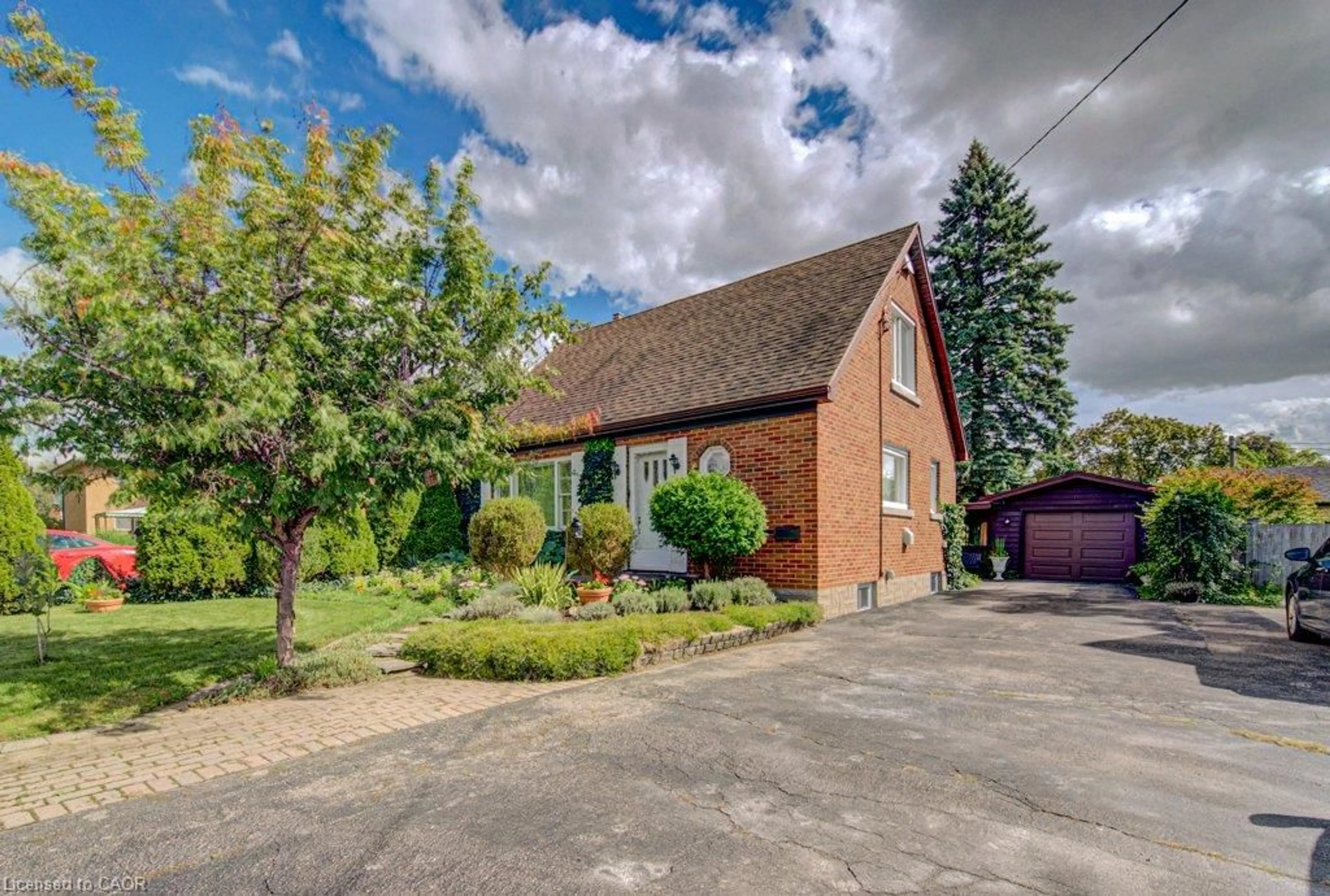 Home with brick exterior material, street for 161 Bridgeport Rd, Waterloo Ontario N2J 2K3