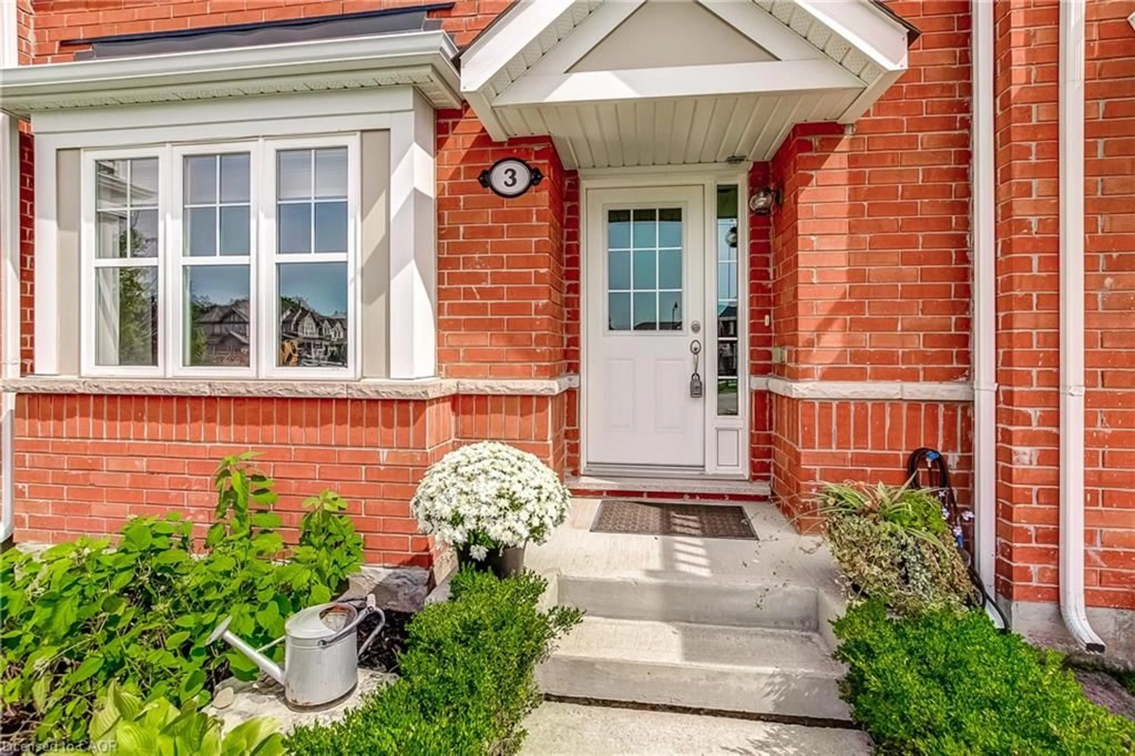 Home with brick exterior material, street for 230 Avonsyde Blvd #3, Waterdown Ontario L8B 1T9