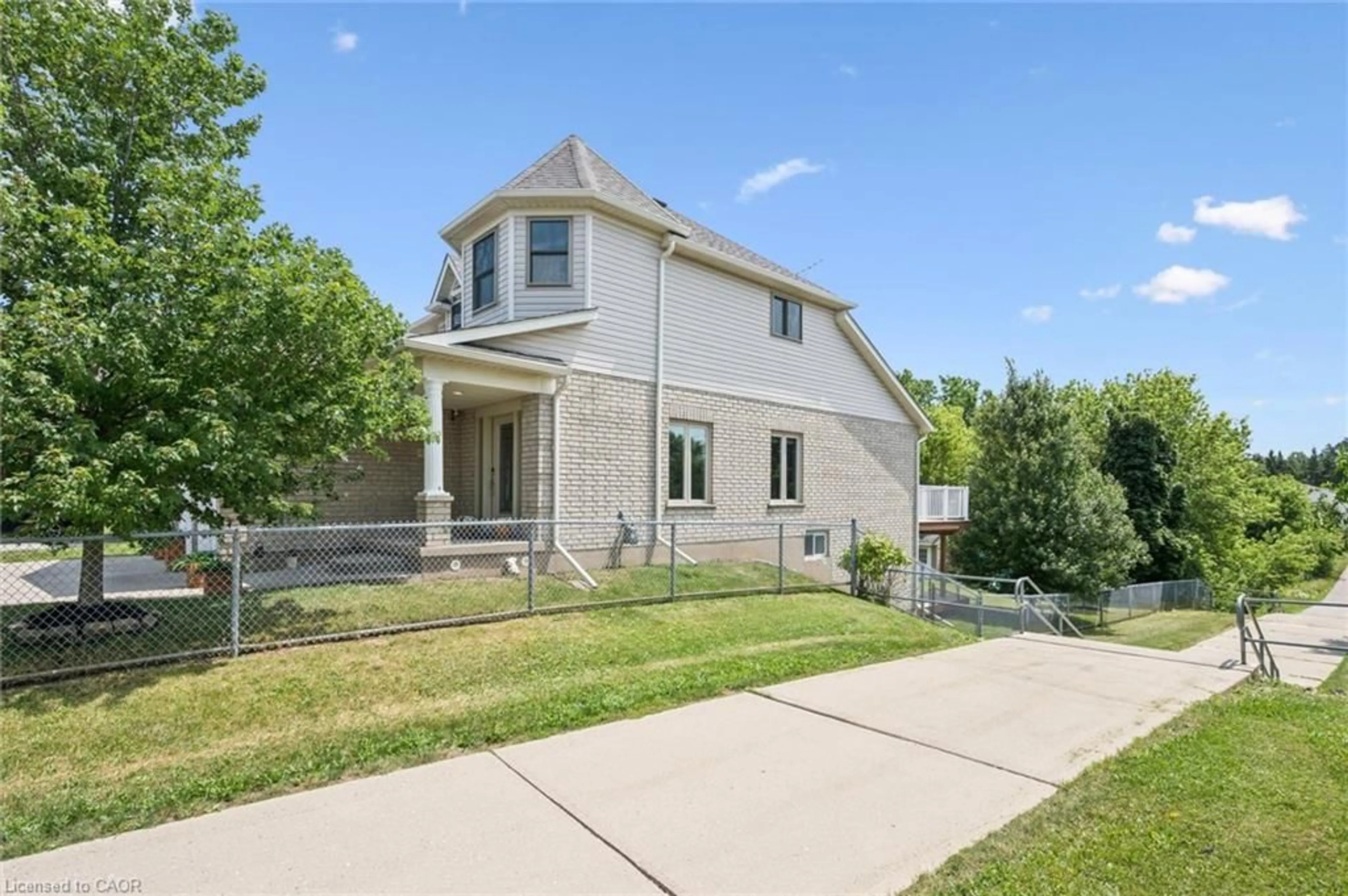 Home with brick exterior material, street for 426 Hidden Creek Dr, Kitchener Ontario N2N 3N2