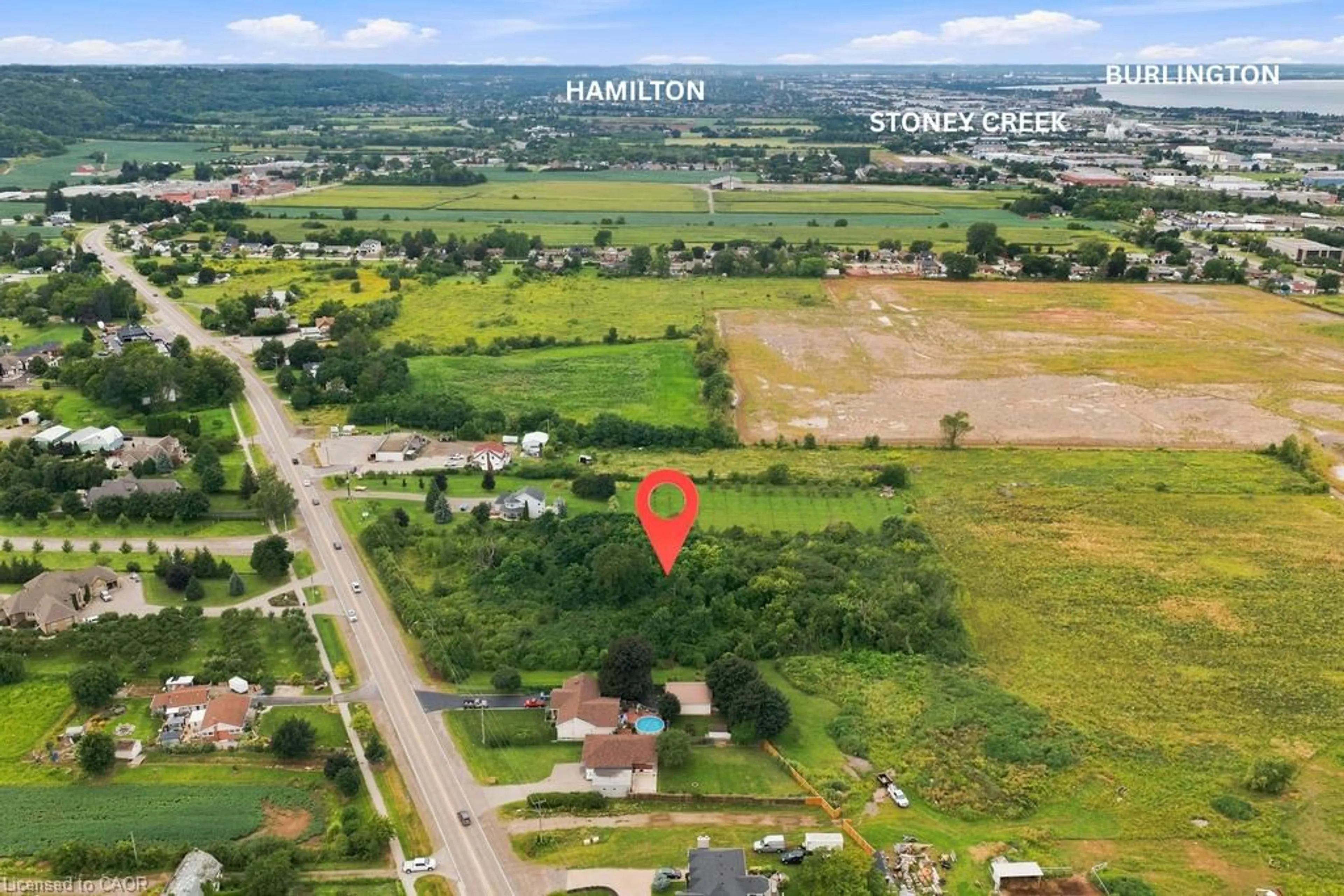 A pic from outside/outdoor area/front of a property/back of a property/a pic from drone, mountain view for 1109 Highway 8, Stoney Creek Ontario L8E 5H8
