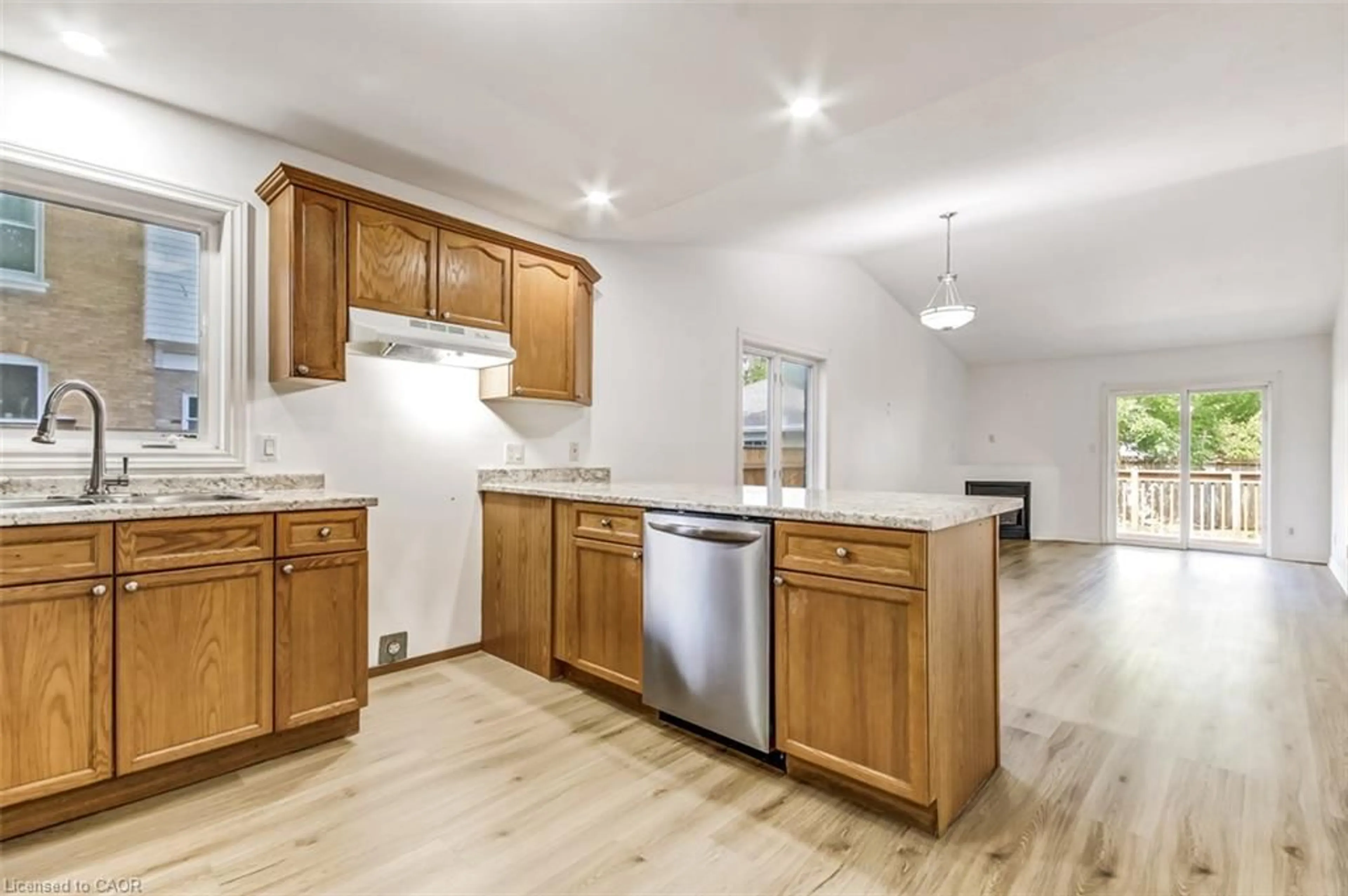 Open concept kitchen, wood/laminate floor for 177 Church St, Delhi Ontario N4B 1W2