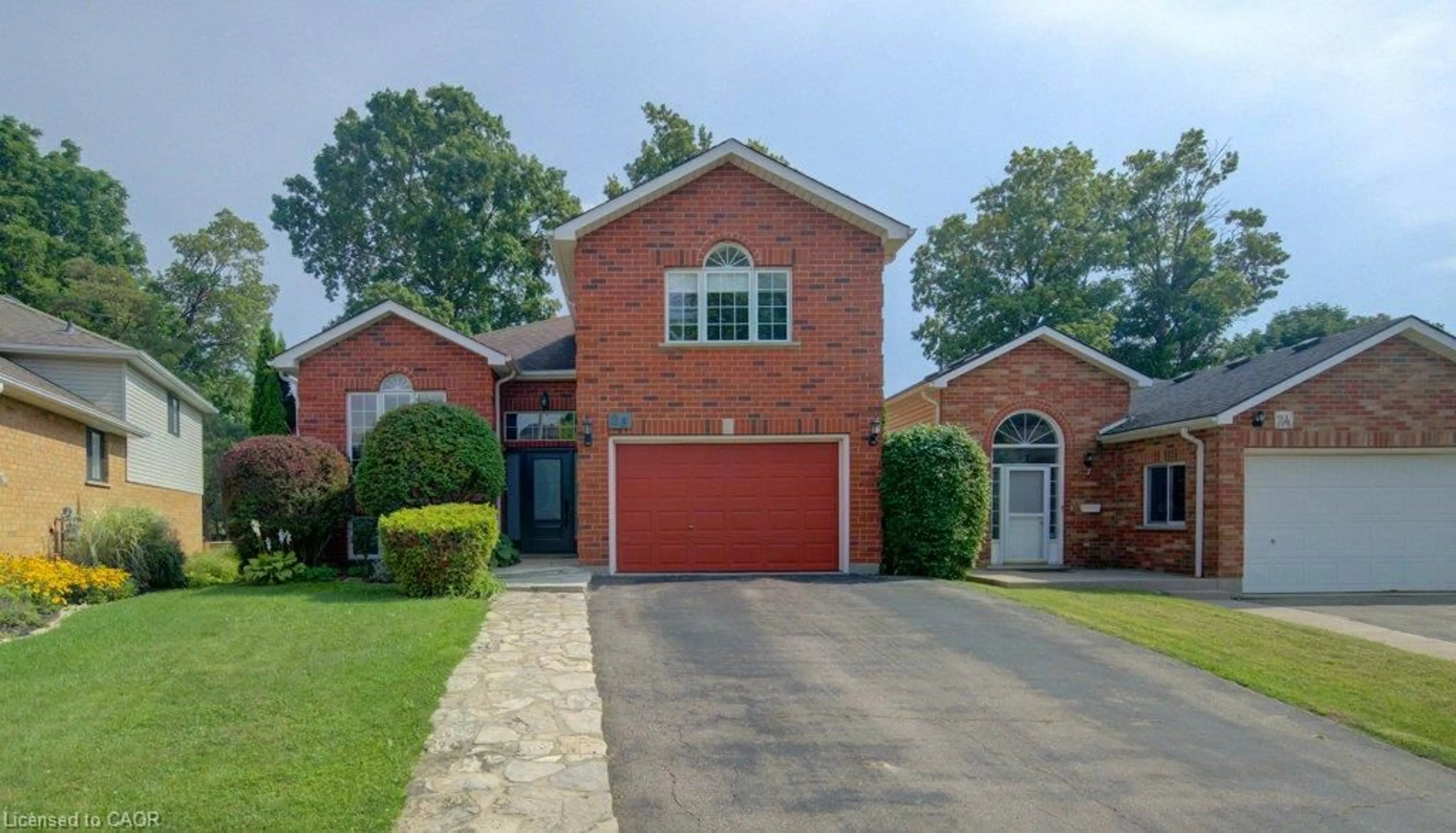 Home with brick exterior material, street for 26 Stanmore Ave, Kitchener Ontario N2B 3W2