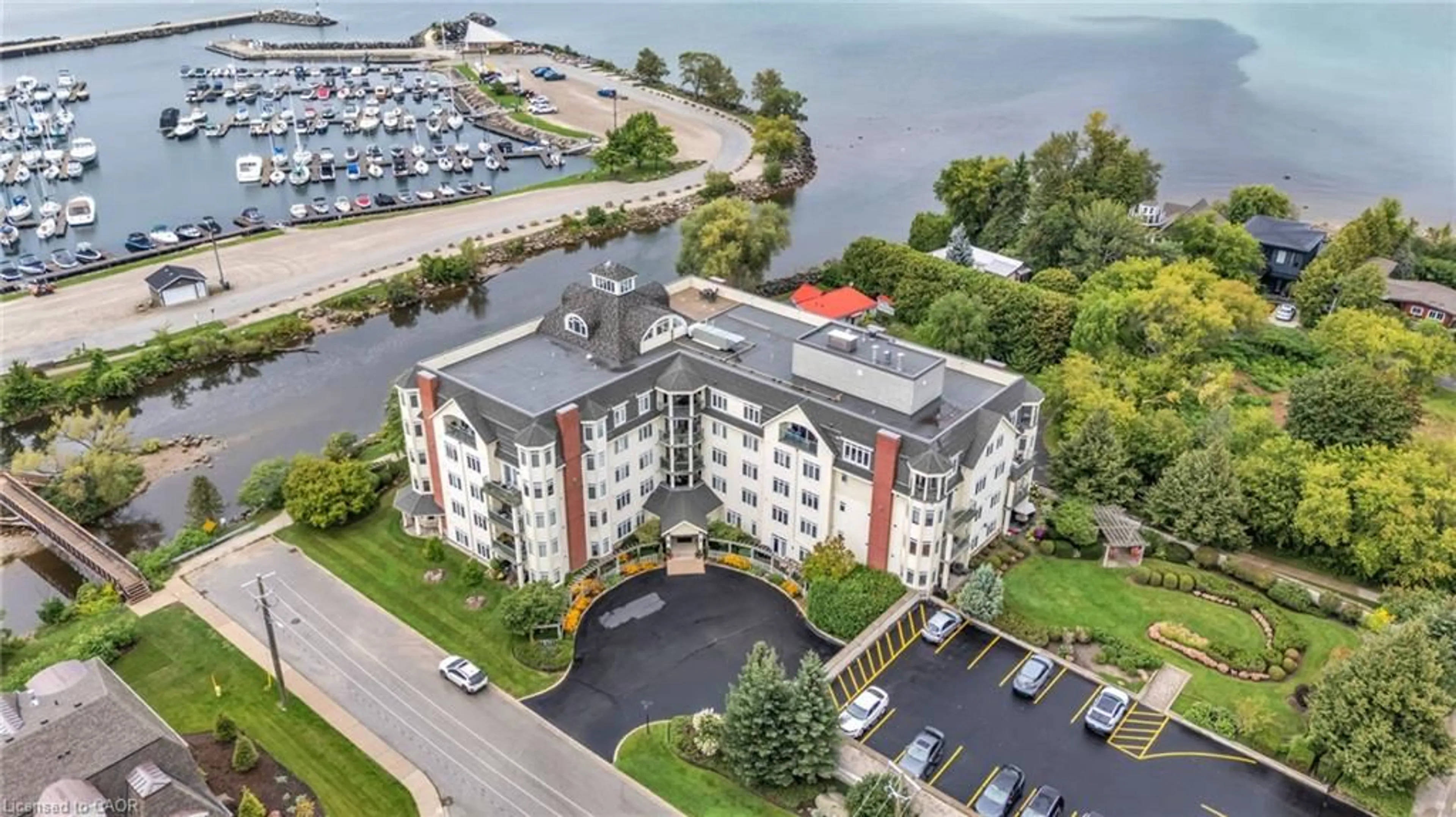 A pic from outside/outdoor area/front of a property/back of a property/a pic from drone, water/lake/river/ocean view for 10 Bay St #307, Thornbury Ontario N0H 2P0