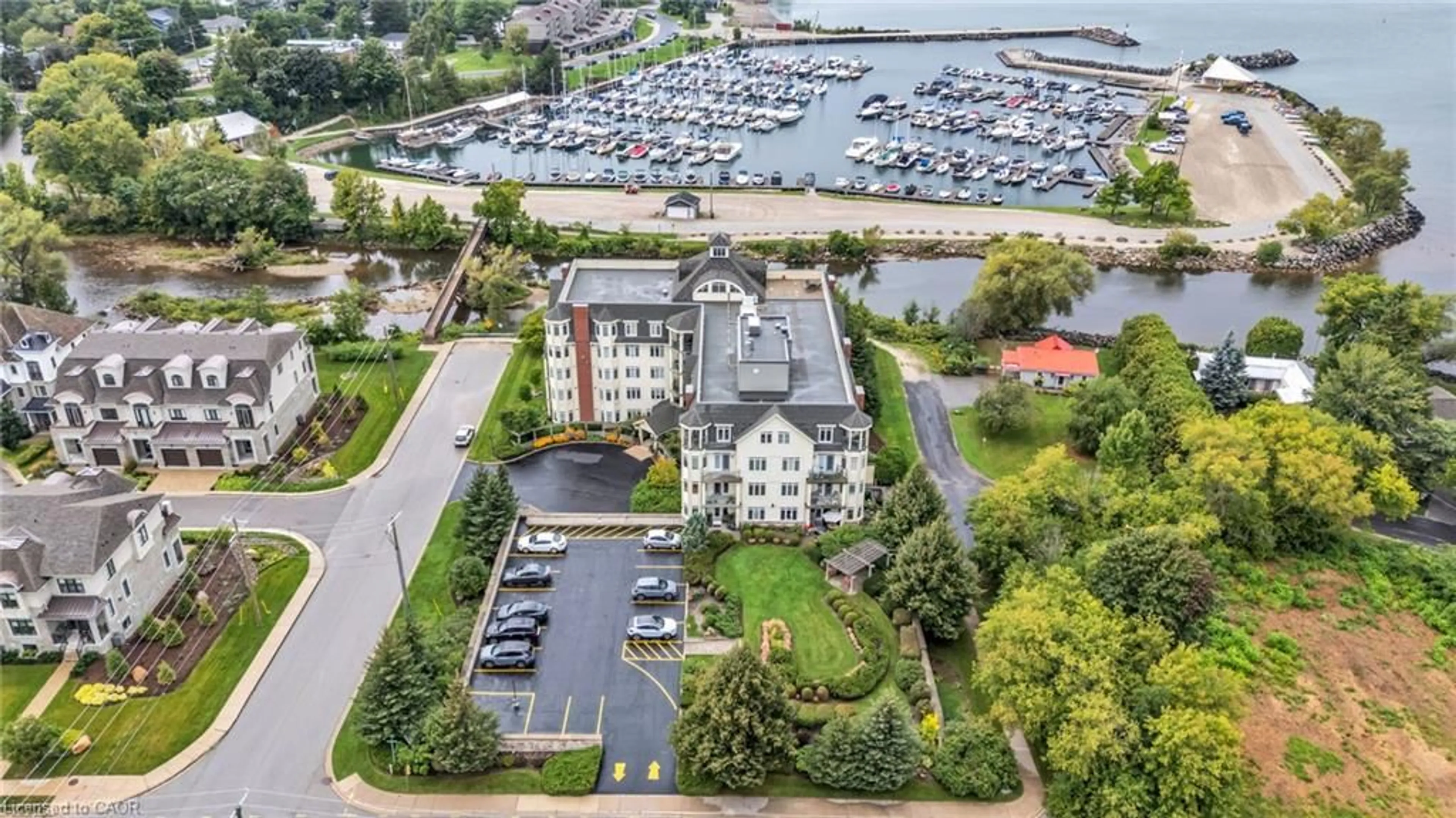 A pic from outside/outdoor area/front of a property/back of a property/a pic from drone, water/lake/river/ocean view for 10 Bay St #307, Thornbury Ontario N0H 2P0