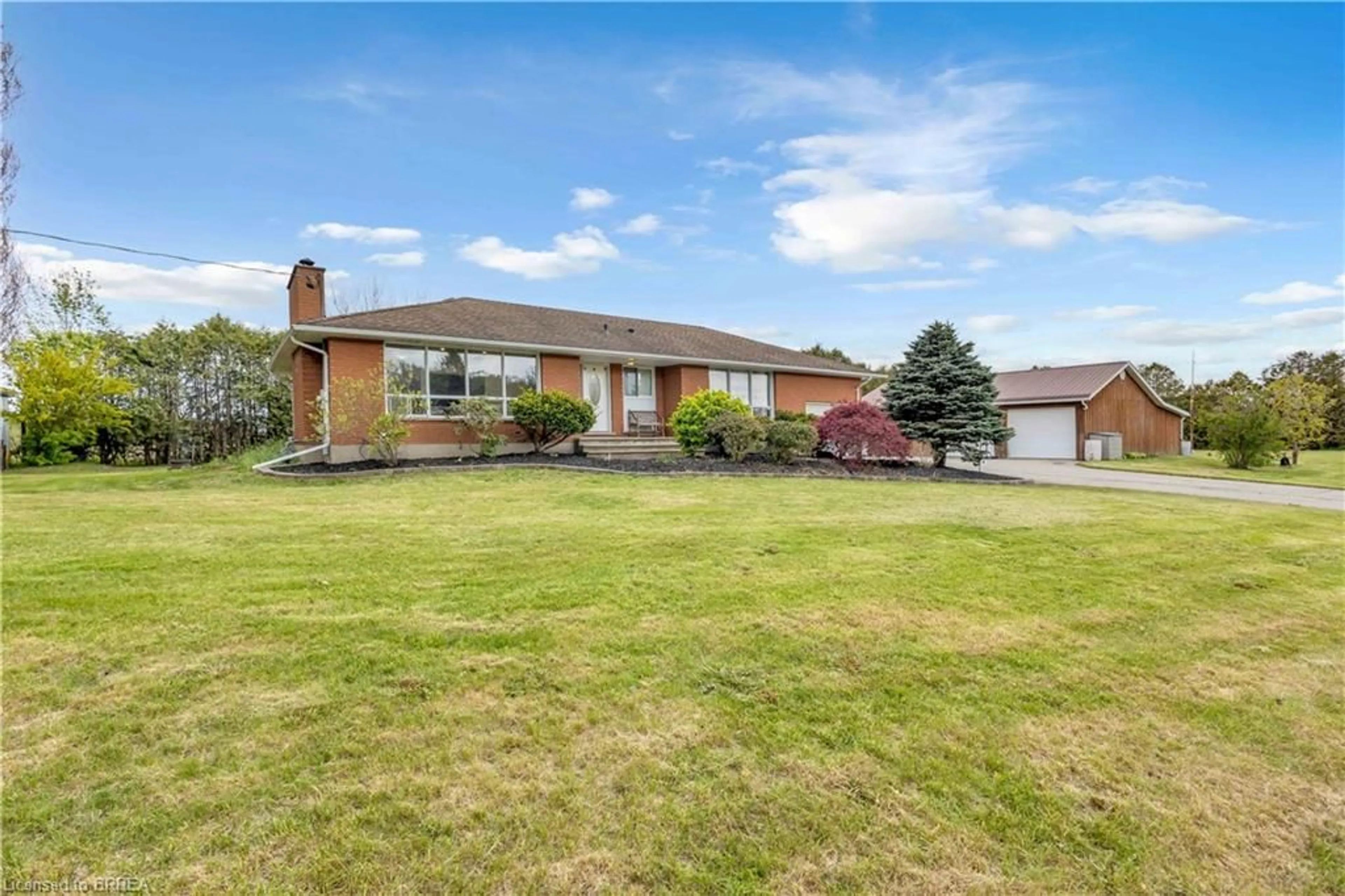 A pic from outside/outdoor area/front of a property/back of a property/a pic from drone, unknown for 348 Windham Rd 12 Rd, Simcoe Ontario N3Y 4K6