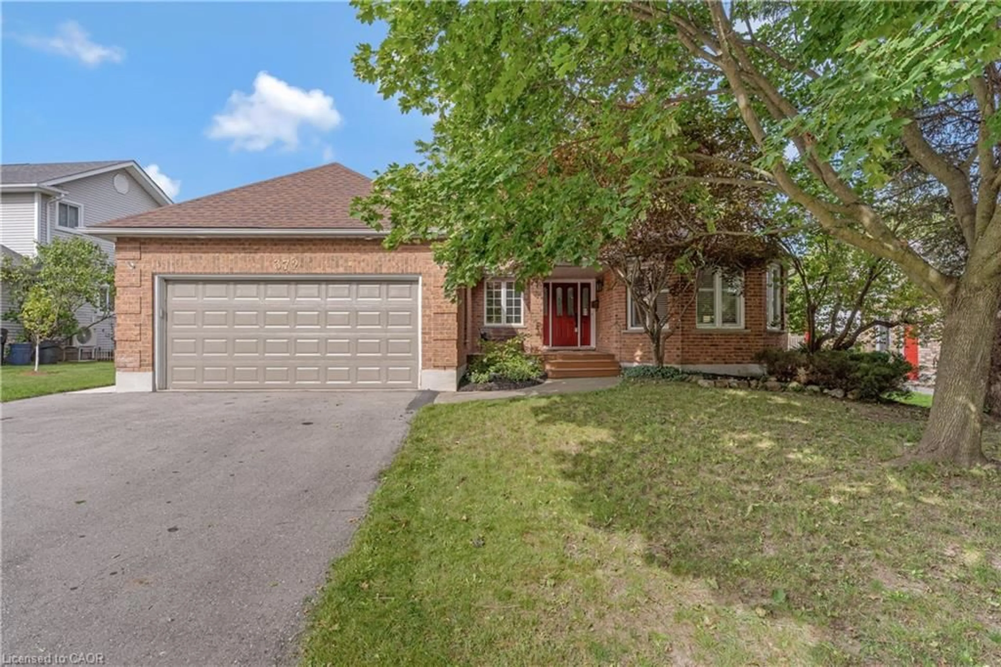 Home with brick exterior material, street for 372 Gatestone Blvd, Waterloo Ontario N2T 2J6