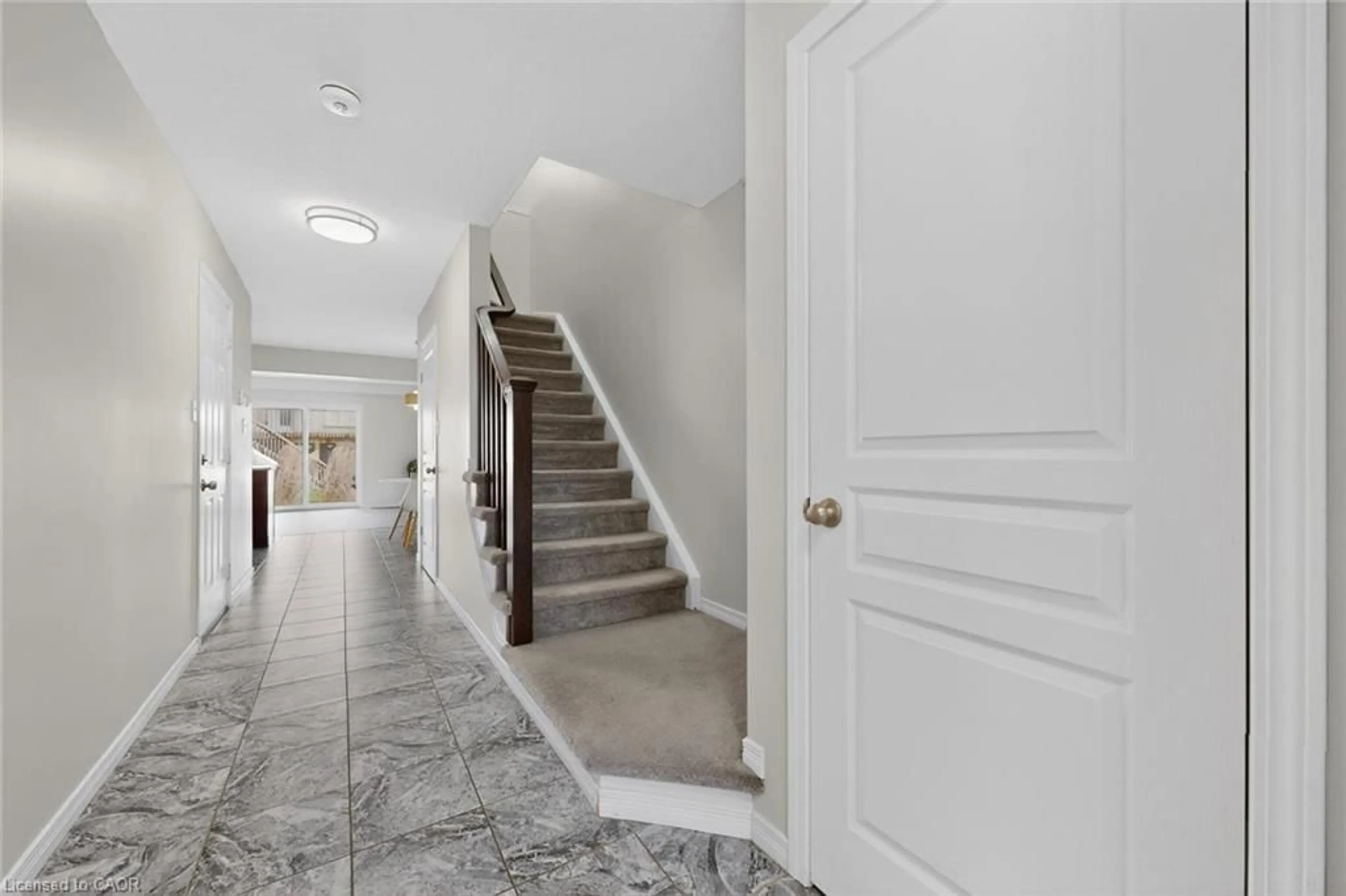 Indoor entryway for 73 Grand Flats Trail, Kitchener Ontario N2A 0H7
