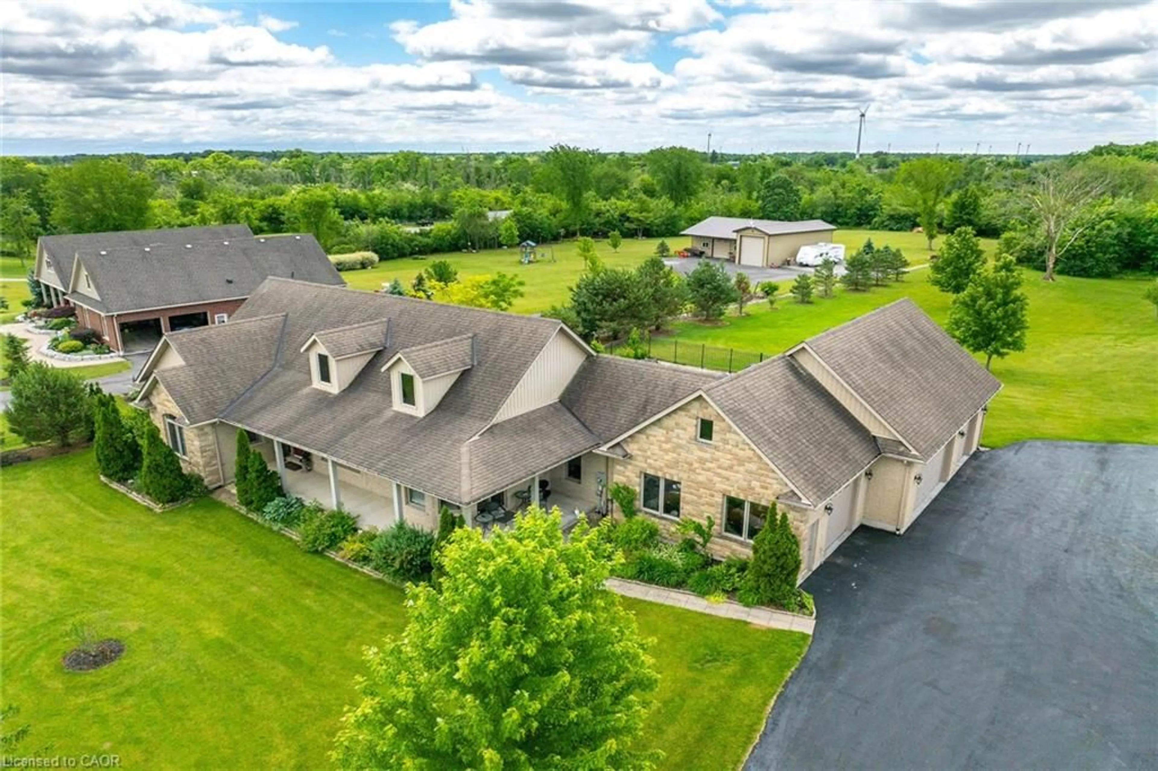 A pic from outside/outdoor area/front of a property/back of a property/a pic from drone, unknown for 850 Regional Road 27 Rd, Wellandport Ontario L0R 2J0