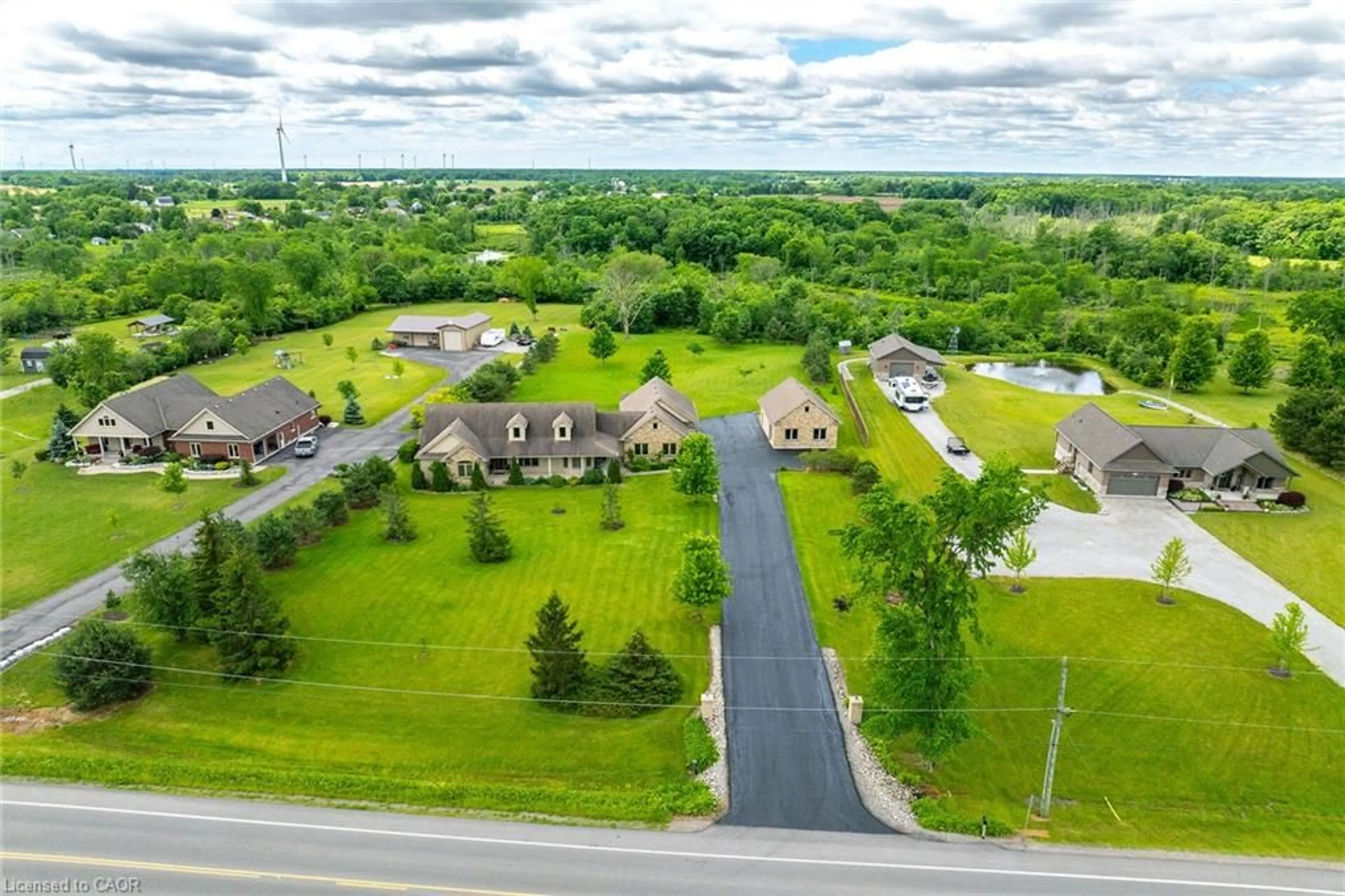 A pic from outside/outdoor area/front of a property/back of a property/a pic from drone, street for 850 Regional Road 27 Rd, Wellandport Ontario L0R 2J0