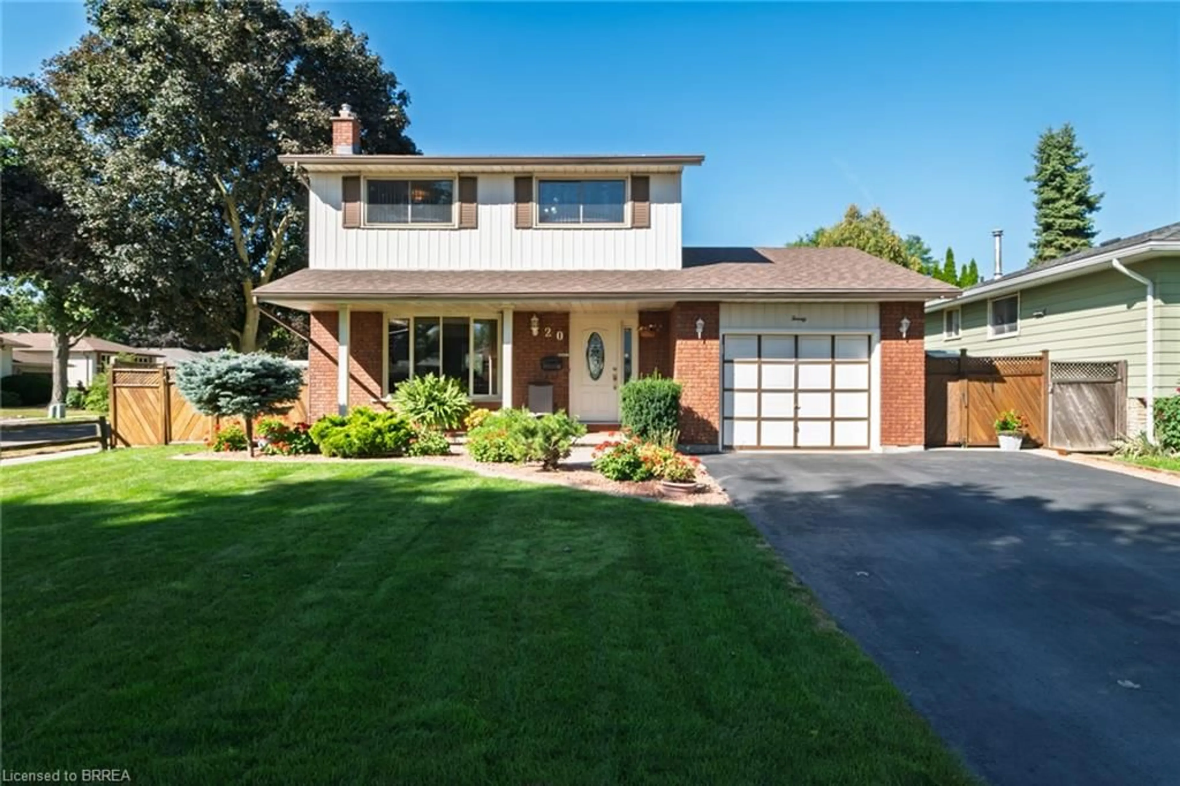 Home with brick exterior material, street for 20 Wildflower Lane, Brantford Ontario N3R 6B4