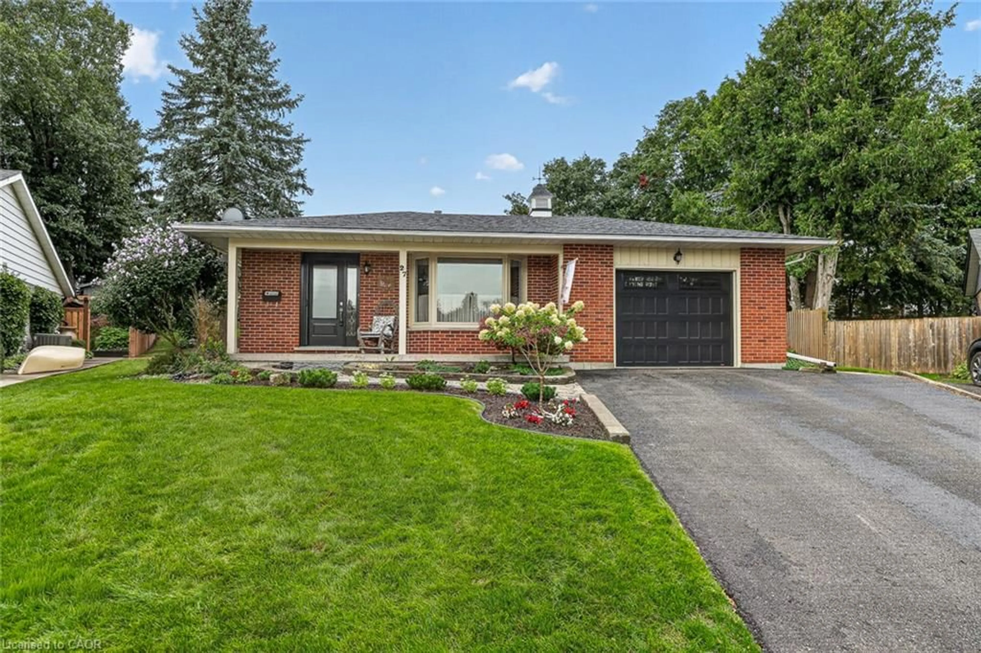 Home with brick exterior material, street for 27 Silcox Pl, Woodstock Ontario N4S 8M8