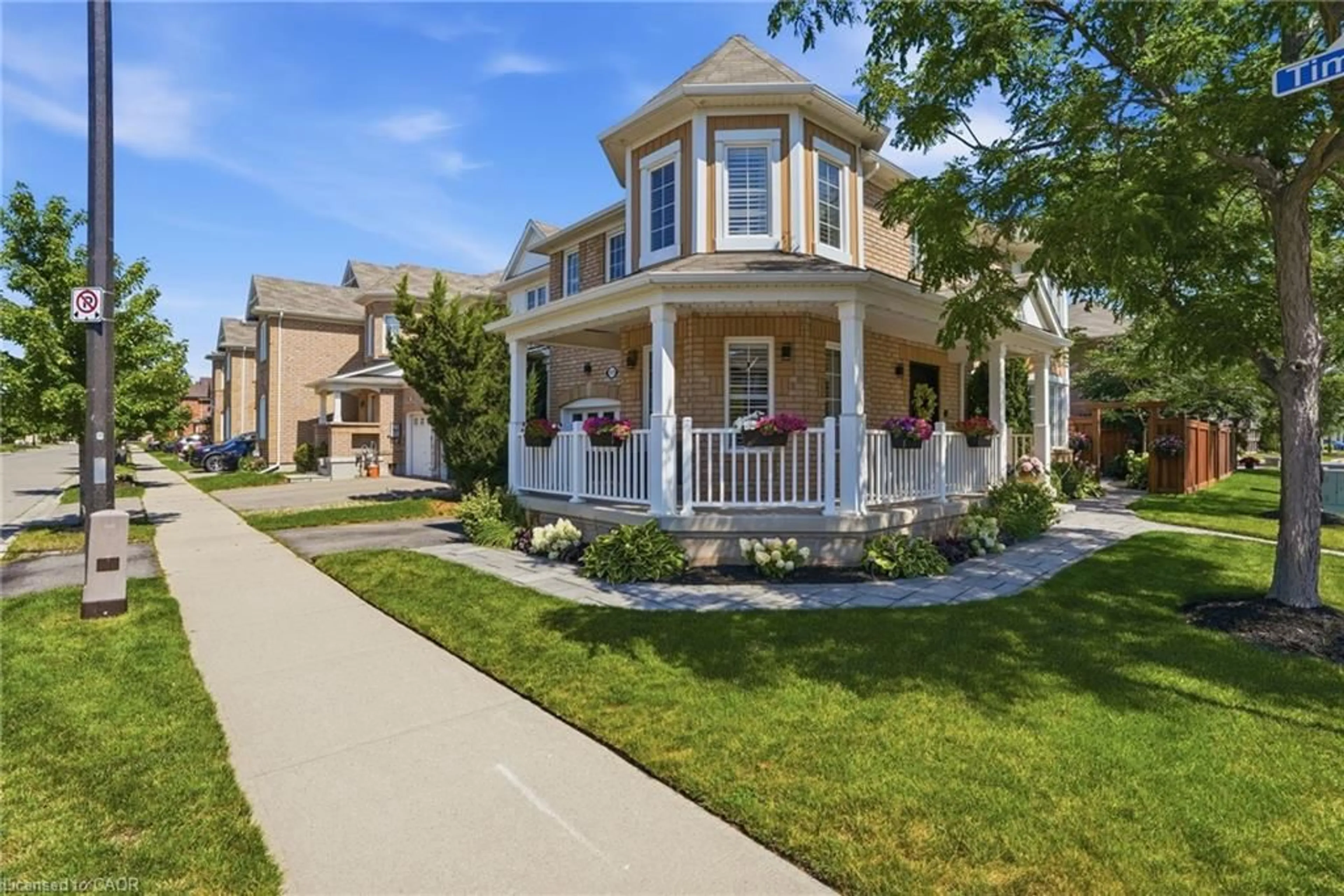 Home with vinyl exterior material, street for 1039 Timmer Pl, Milton Ontario L9T 8H3