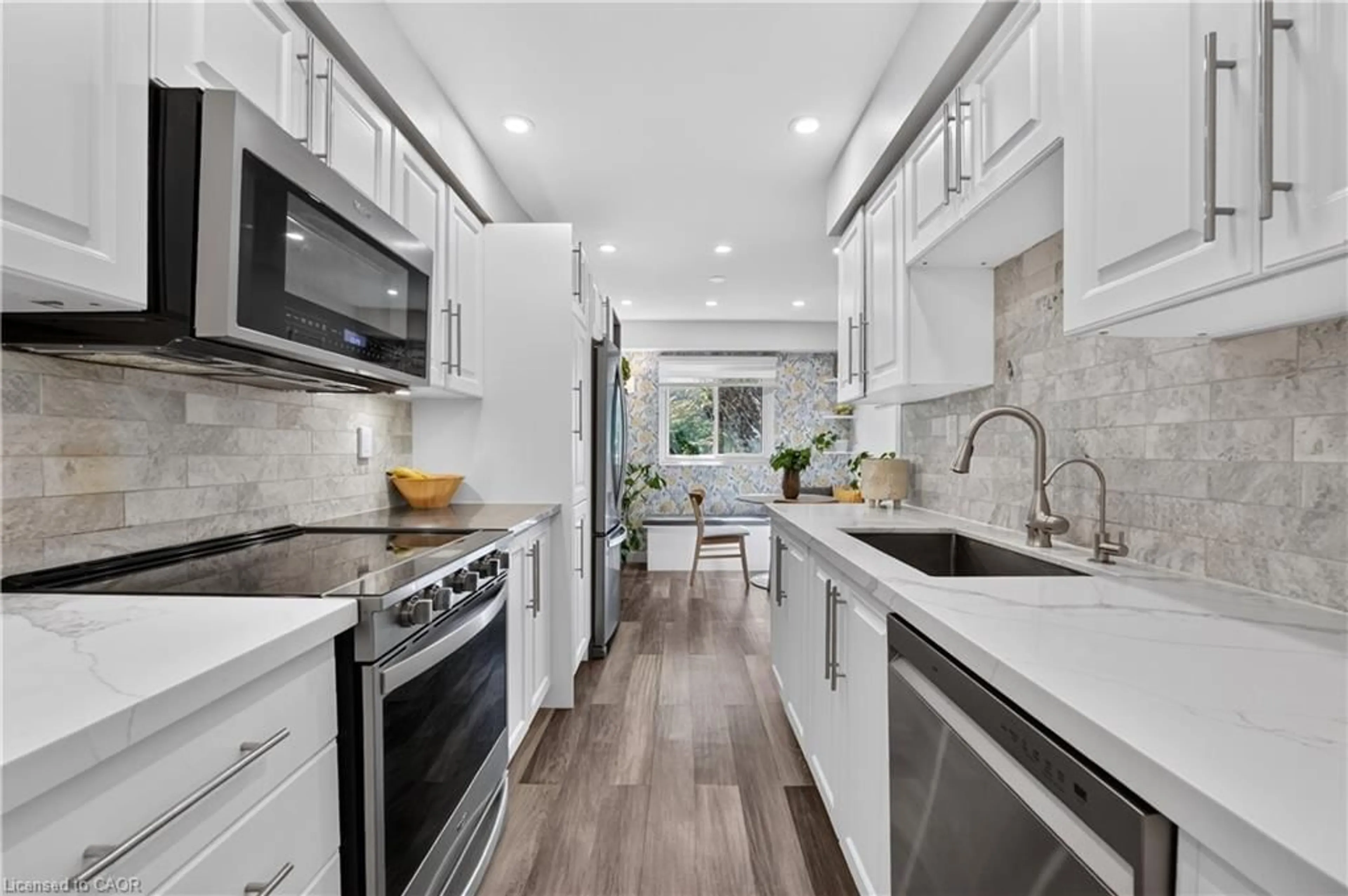 Open concept kitchen, ceramic/tile floor for 59 Maple Ave #8, Georgetown Ontario L7G 1X8