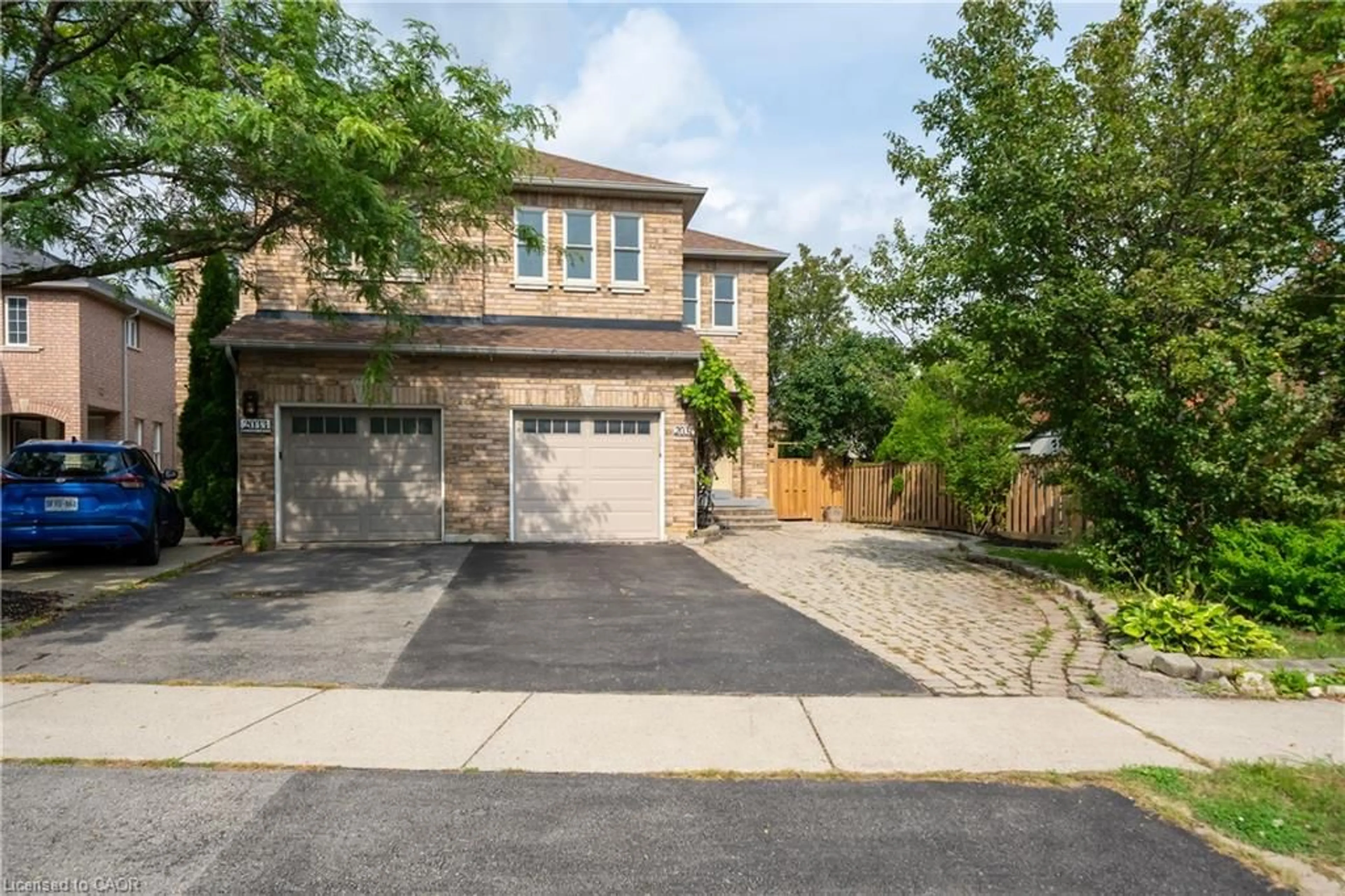 Home with brick exterior material, street for 2031 Westree Dr, Oakville Ontario L6M 3W3