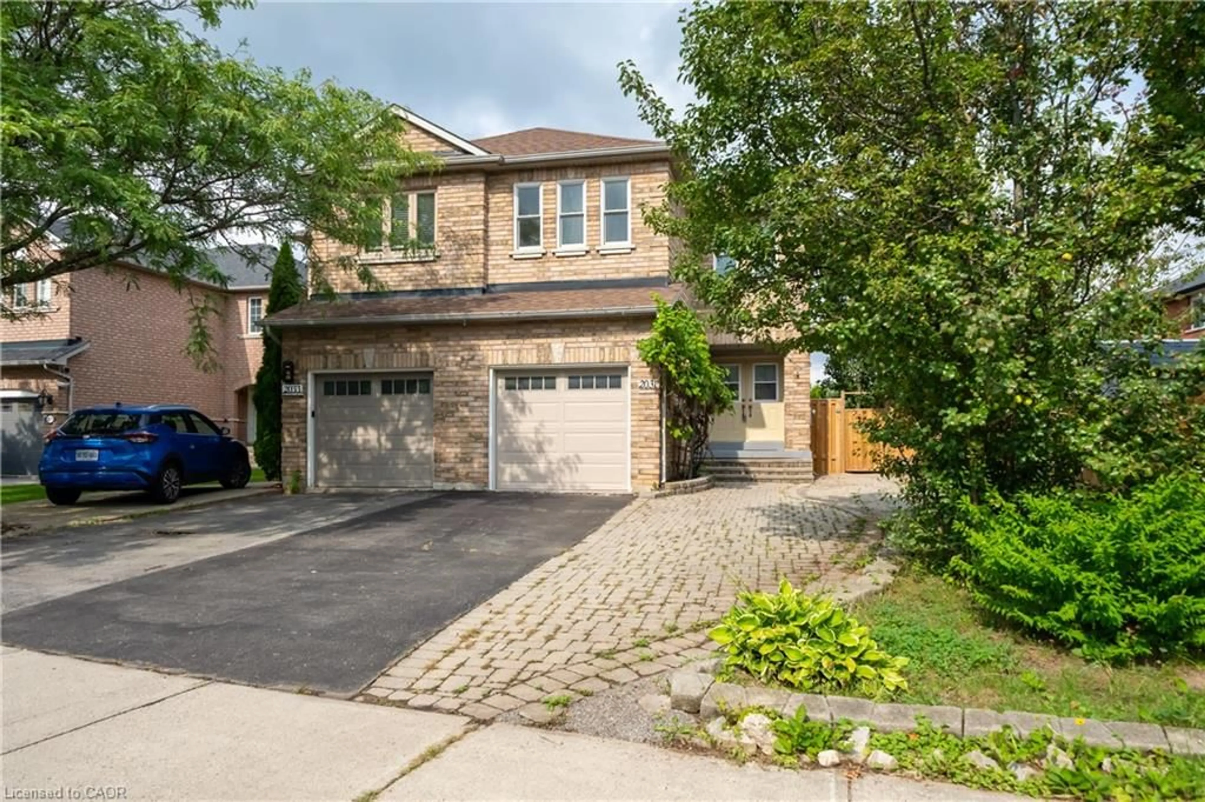 Home with brick exterior material, street for 2031 Westree Dr, Oakville Ontario L6M 3W3