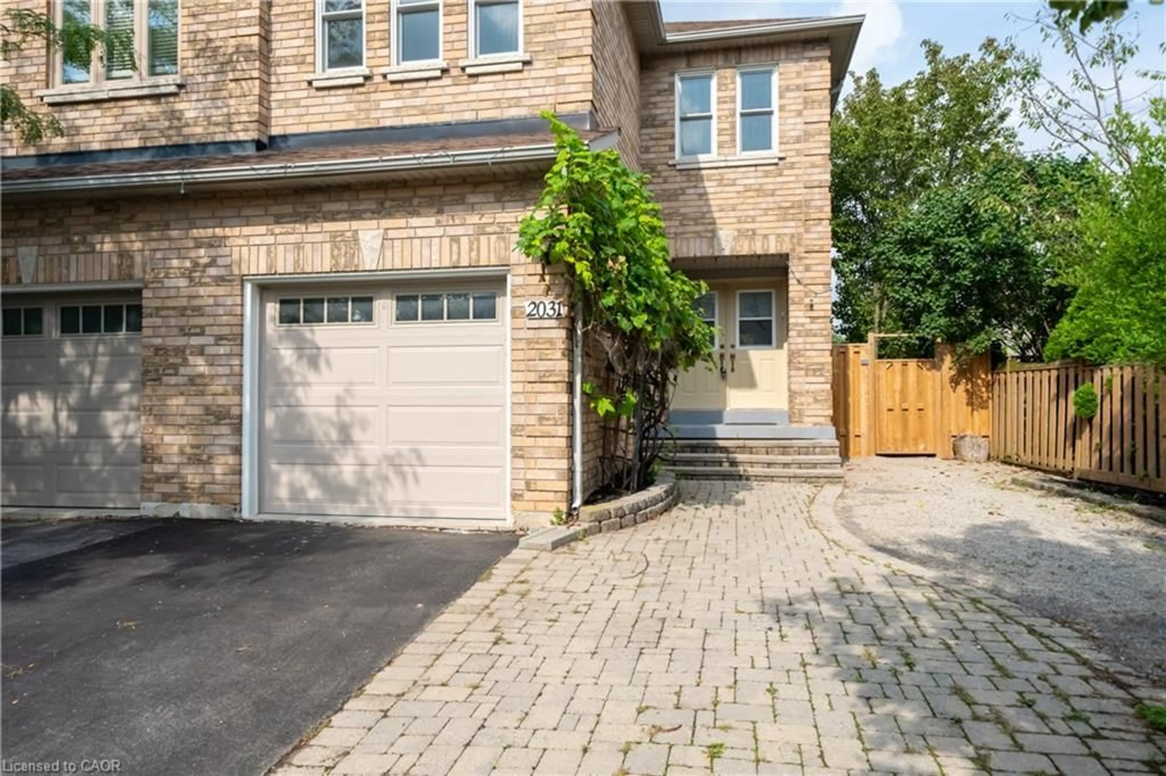 Home with brick exterior material, street for 2031 Westree Dr, Oakville Ontario L6M 3W3
