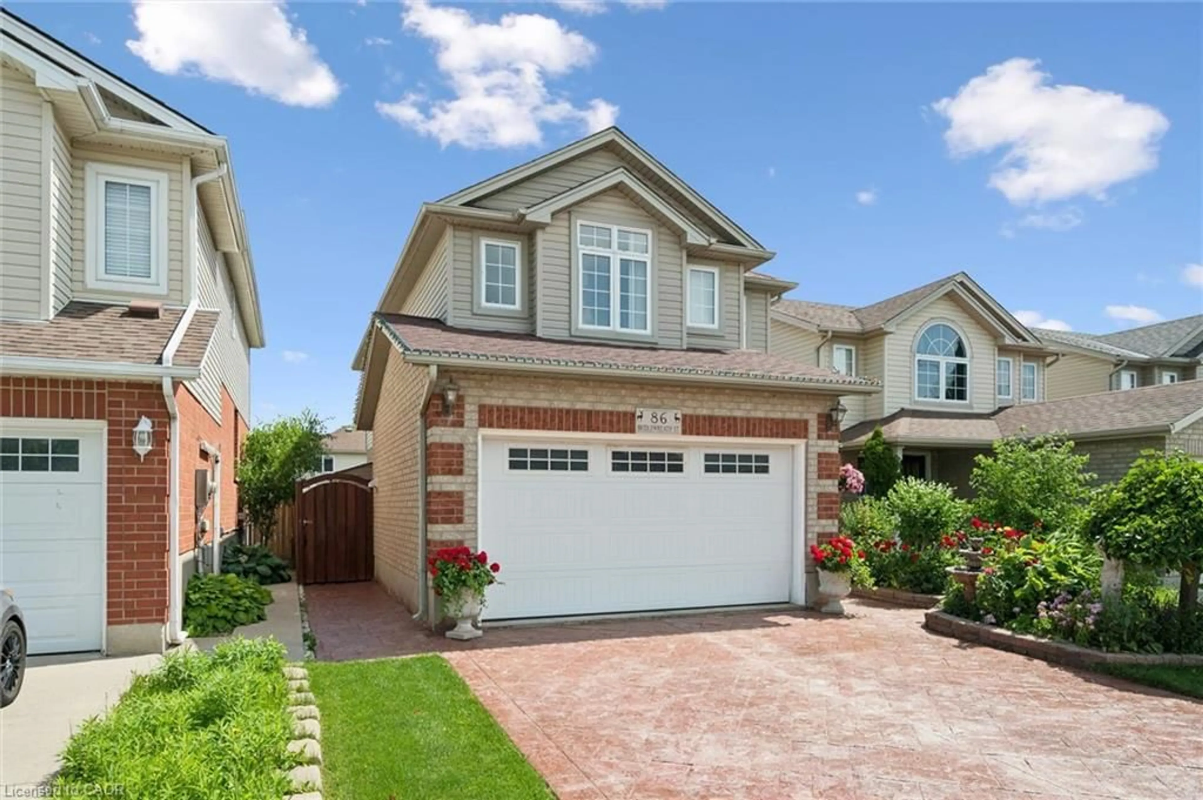 Home with brick exterior material, street for 86 Bridlewreath St, Kitchener Ontario N2E 3V6