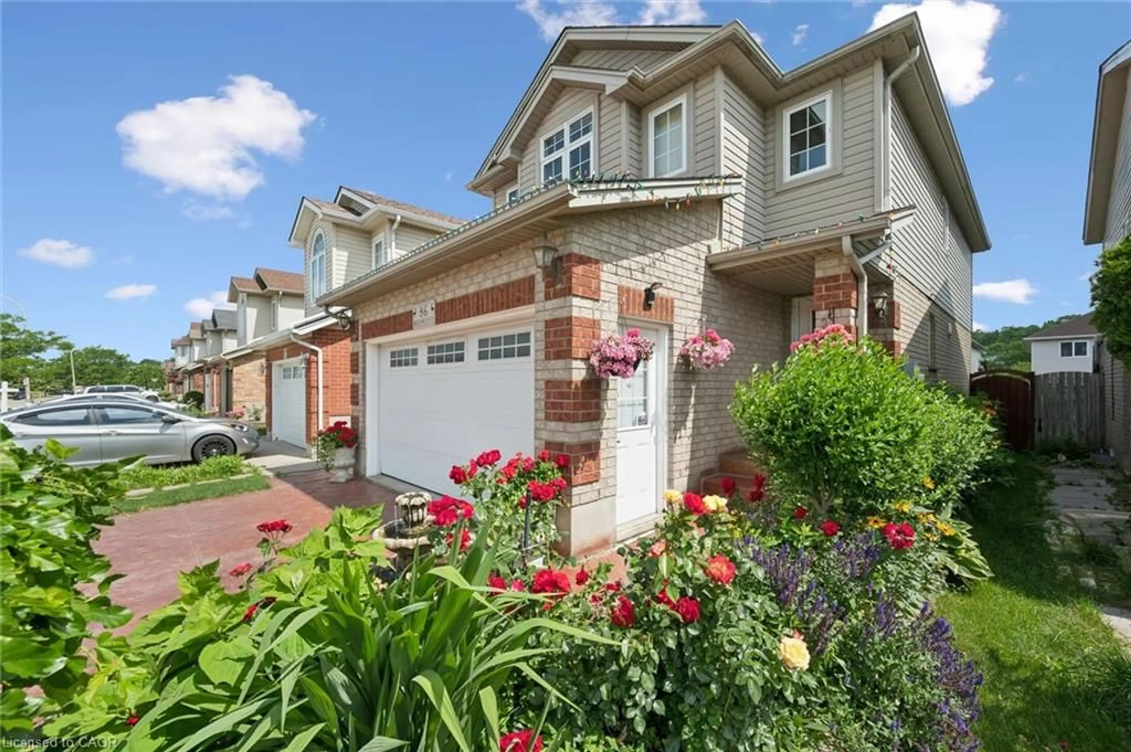 Home with brick exterior material, street for 86 Bridlewreath St, Kitchener Ontario N2E 3V6