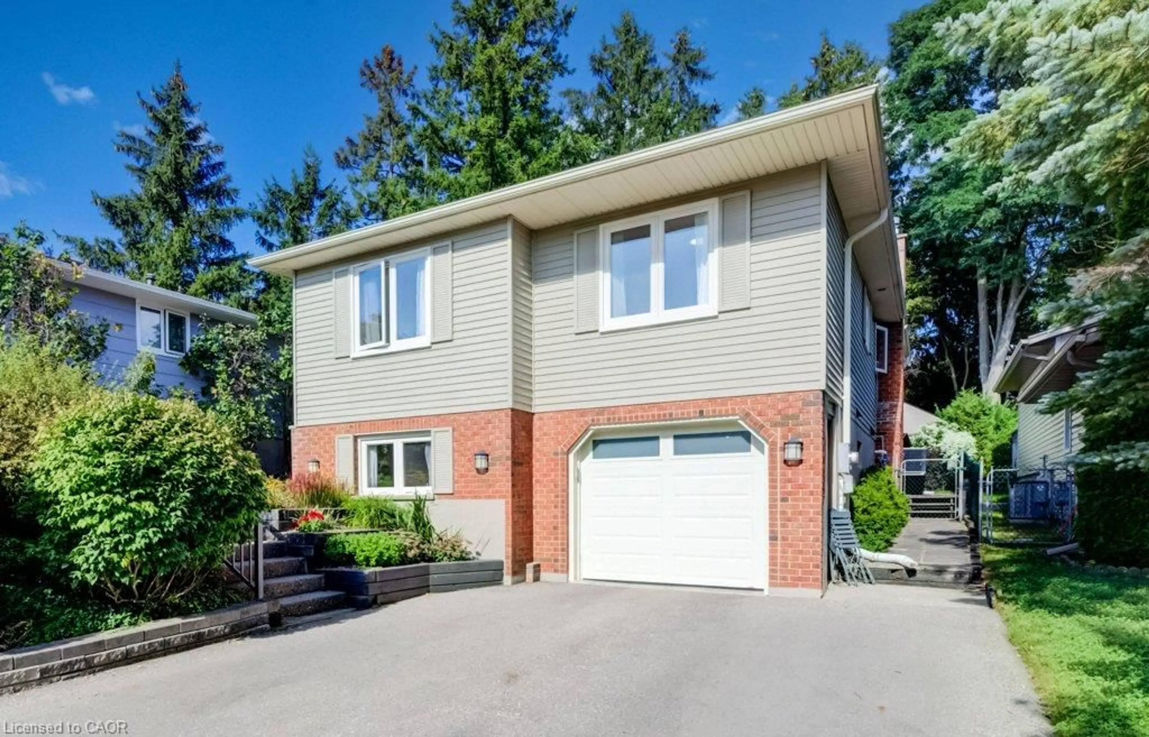 Home with brick exterior material, street for 12 Cobblestone St, Kitchener Ontario N2P 1T7