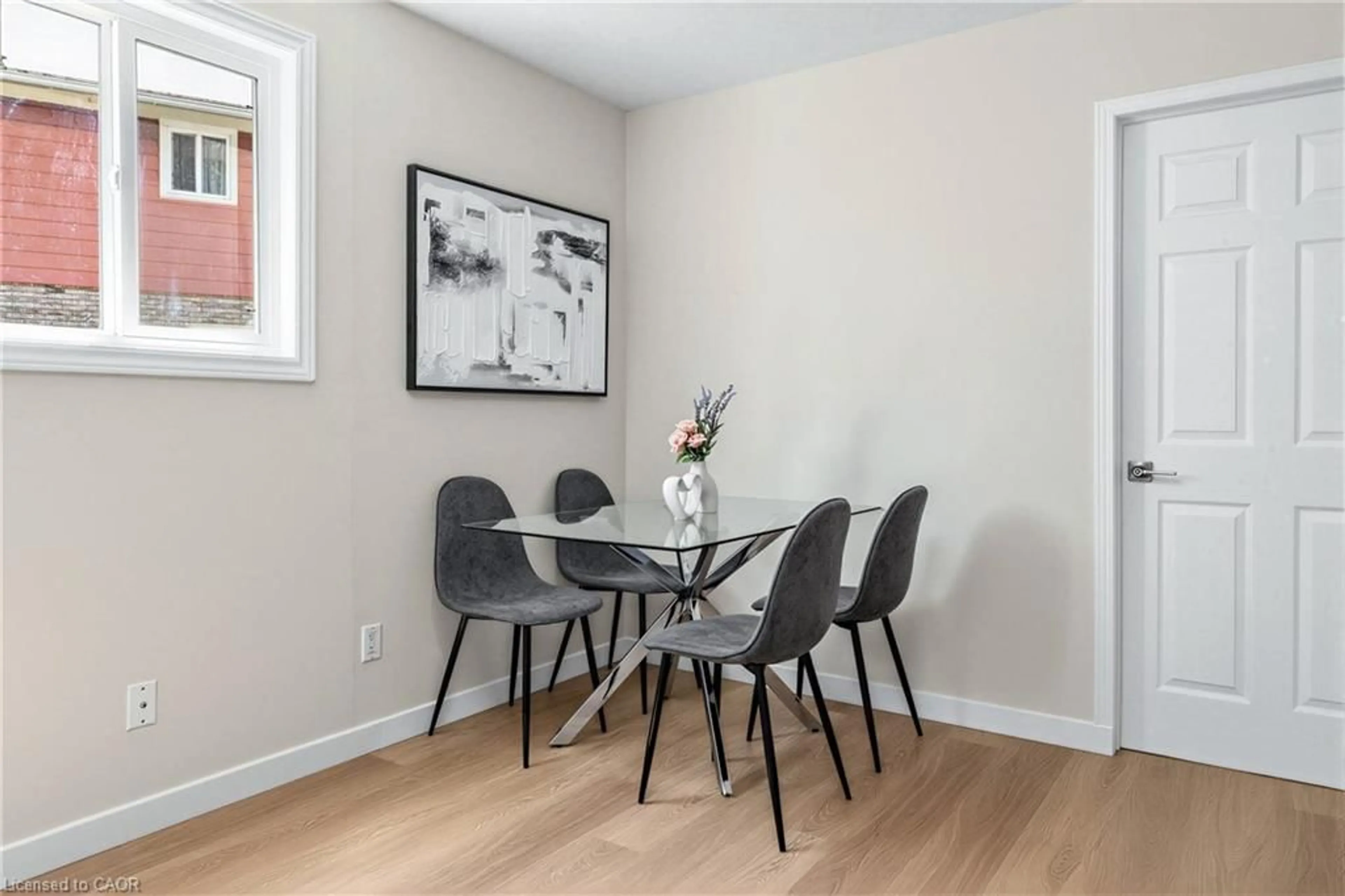 Dining room, wood/laminate floor for 506 Lonelm Crt #A, Waterloo Ontario N2L 5E1