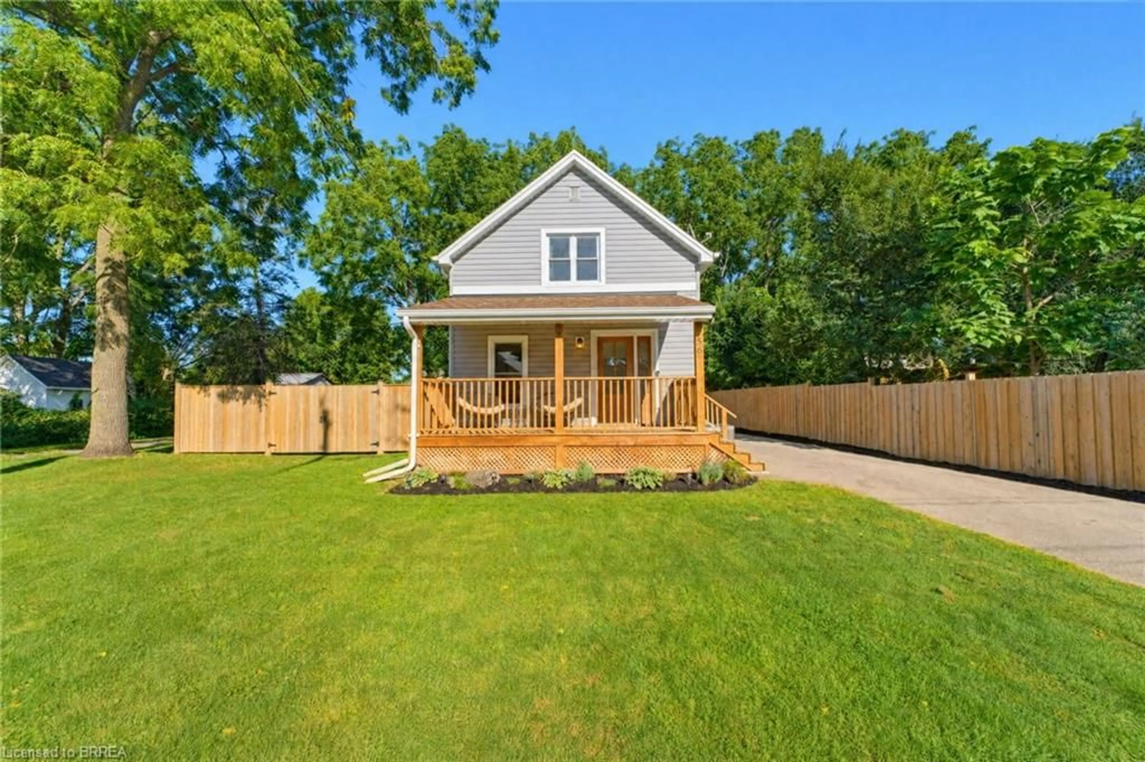 Home with vinyl exterior material, street for 56 Alexander St, Burford Ontario N0E 1A0