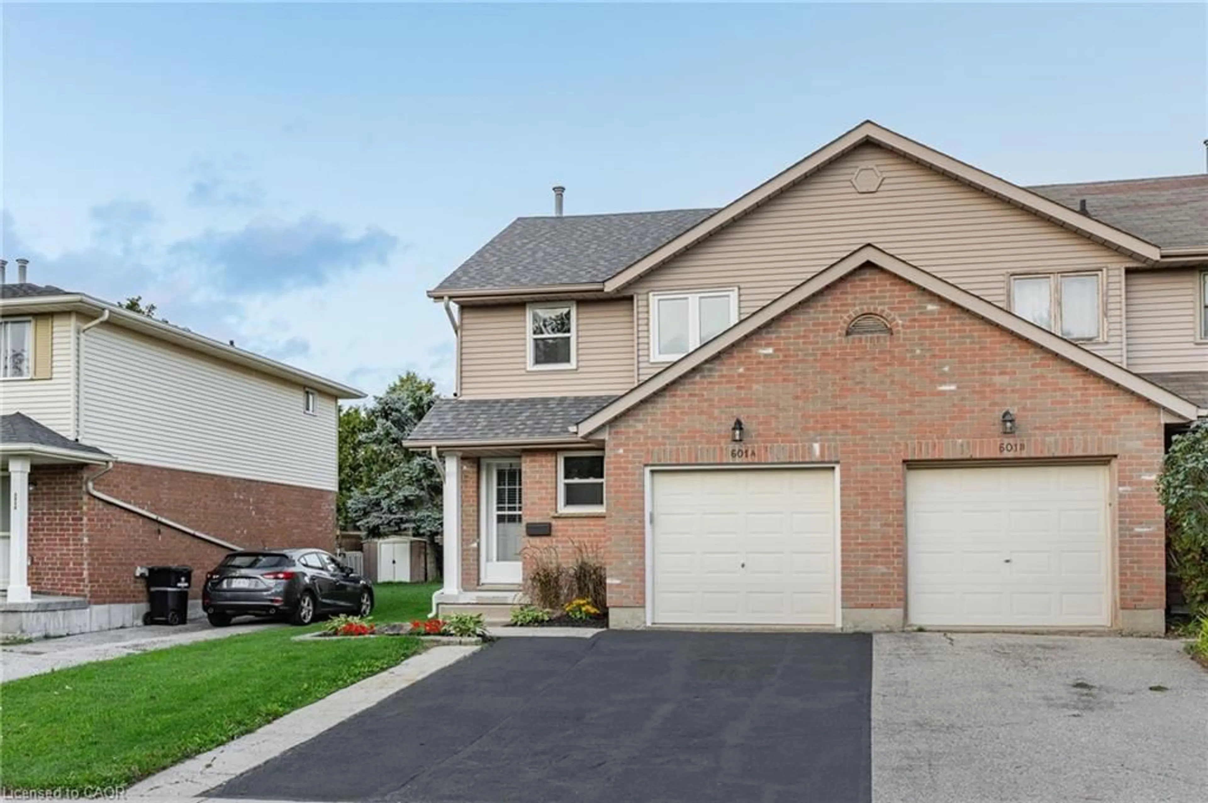 Home with brick exterior material, street for 601 Pinerow Cres #A, Waterloo Ontario N2T 2K6