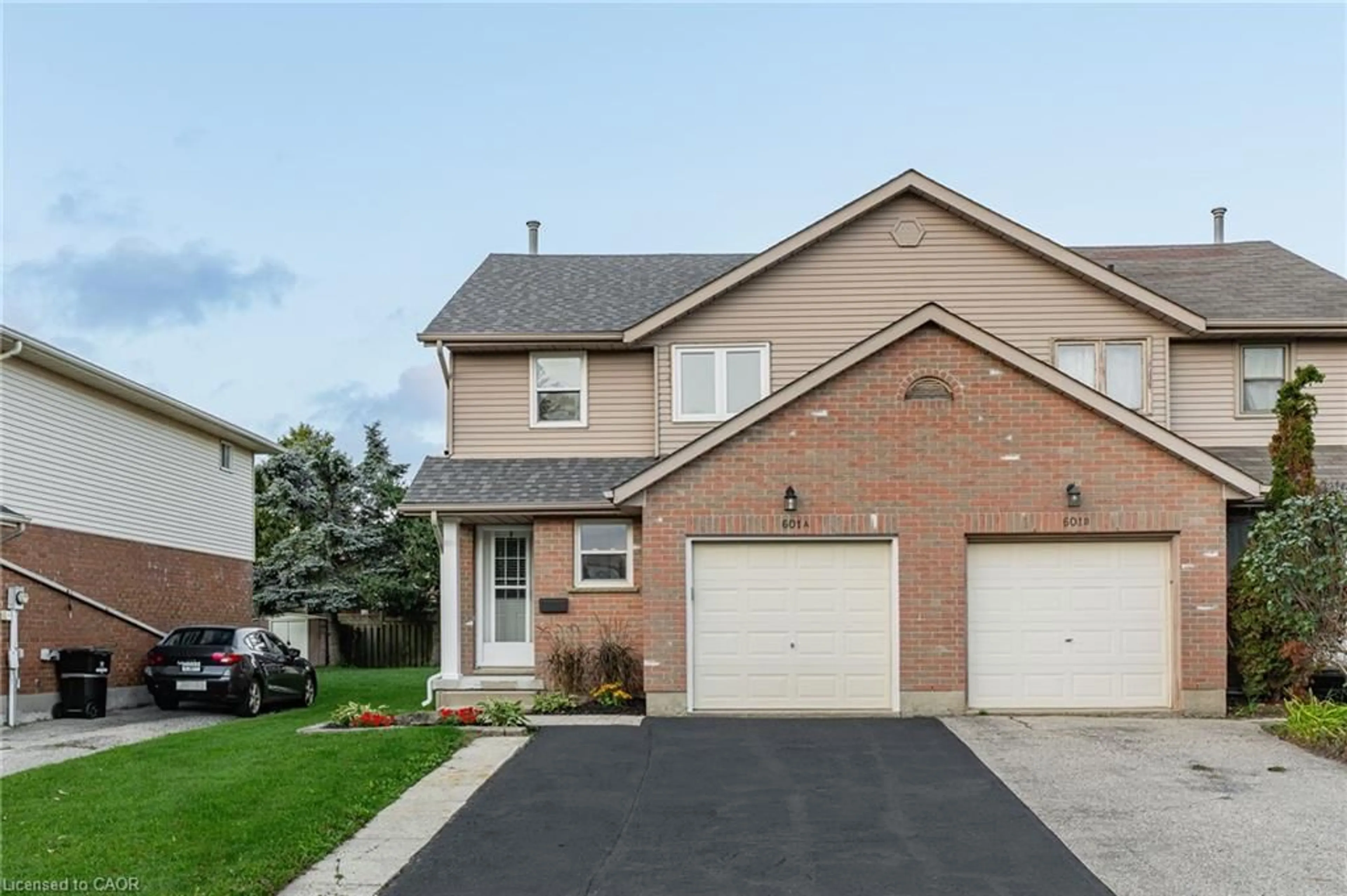 Home with brick exterior material, street for 601 Pinerow Cres #A, Waterloo Ontario N2T 2K6