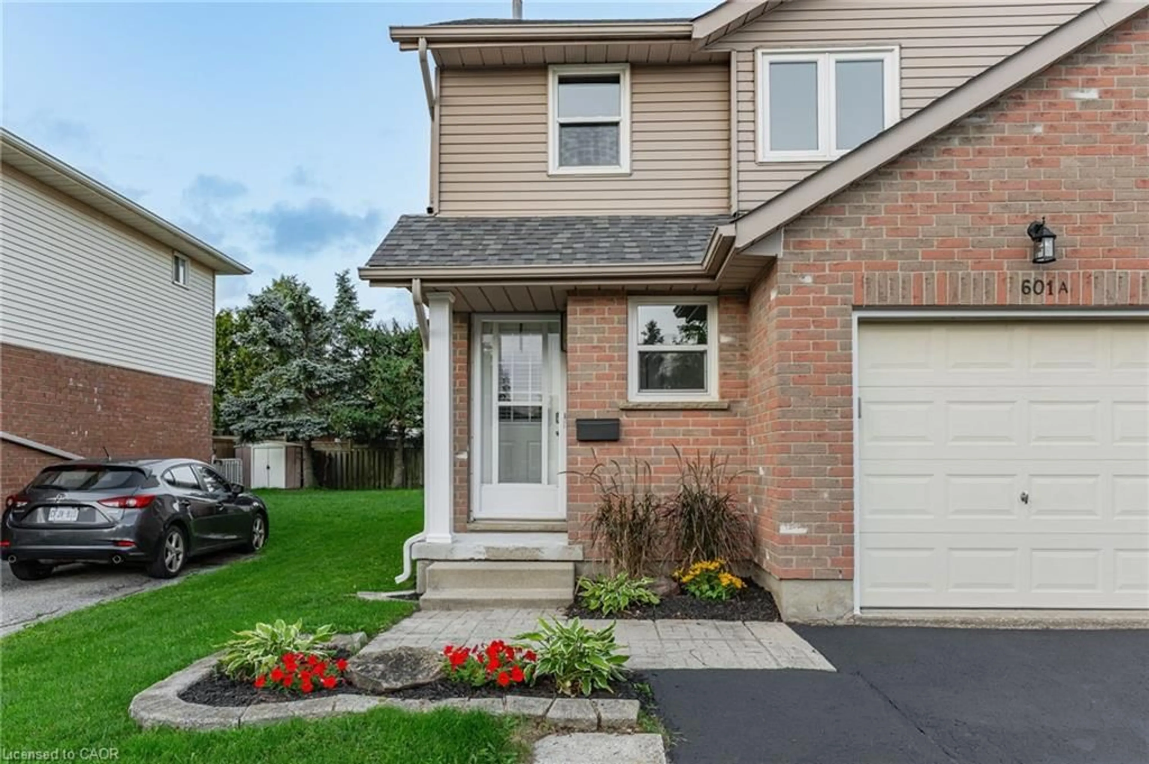 Home with brick exterior material, street for 601 Pinerow Cres #A, Waterloo Ontario N2T 2K6
