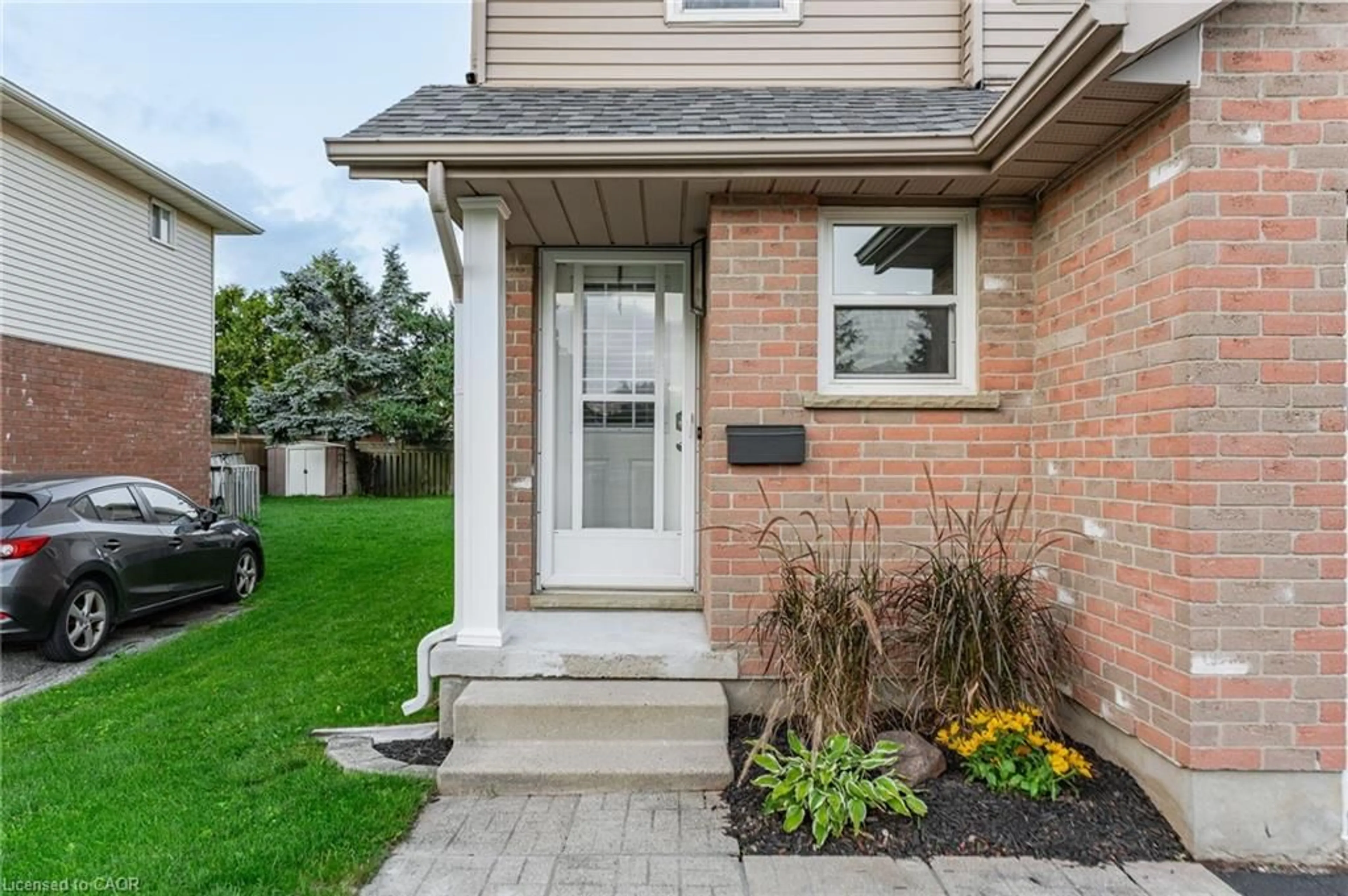 Home with brick exterior material, street for 601 Pinerow Cres #A, Waterloo Ontario N2T 2K6