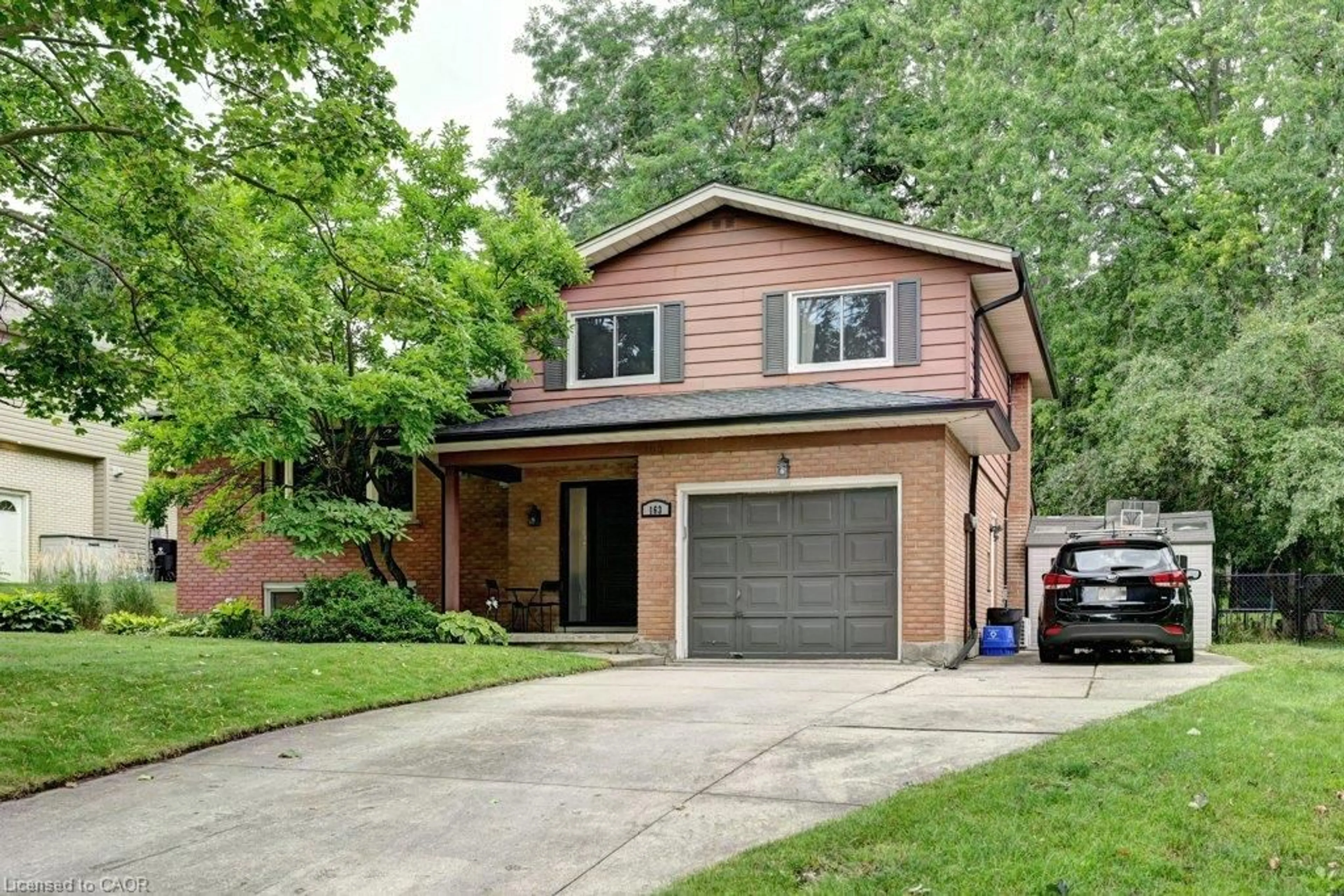 Home with brick exterior material, street for 163 Chelford Cres, Waterloo Ontario N2J 3T7