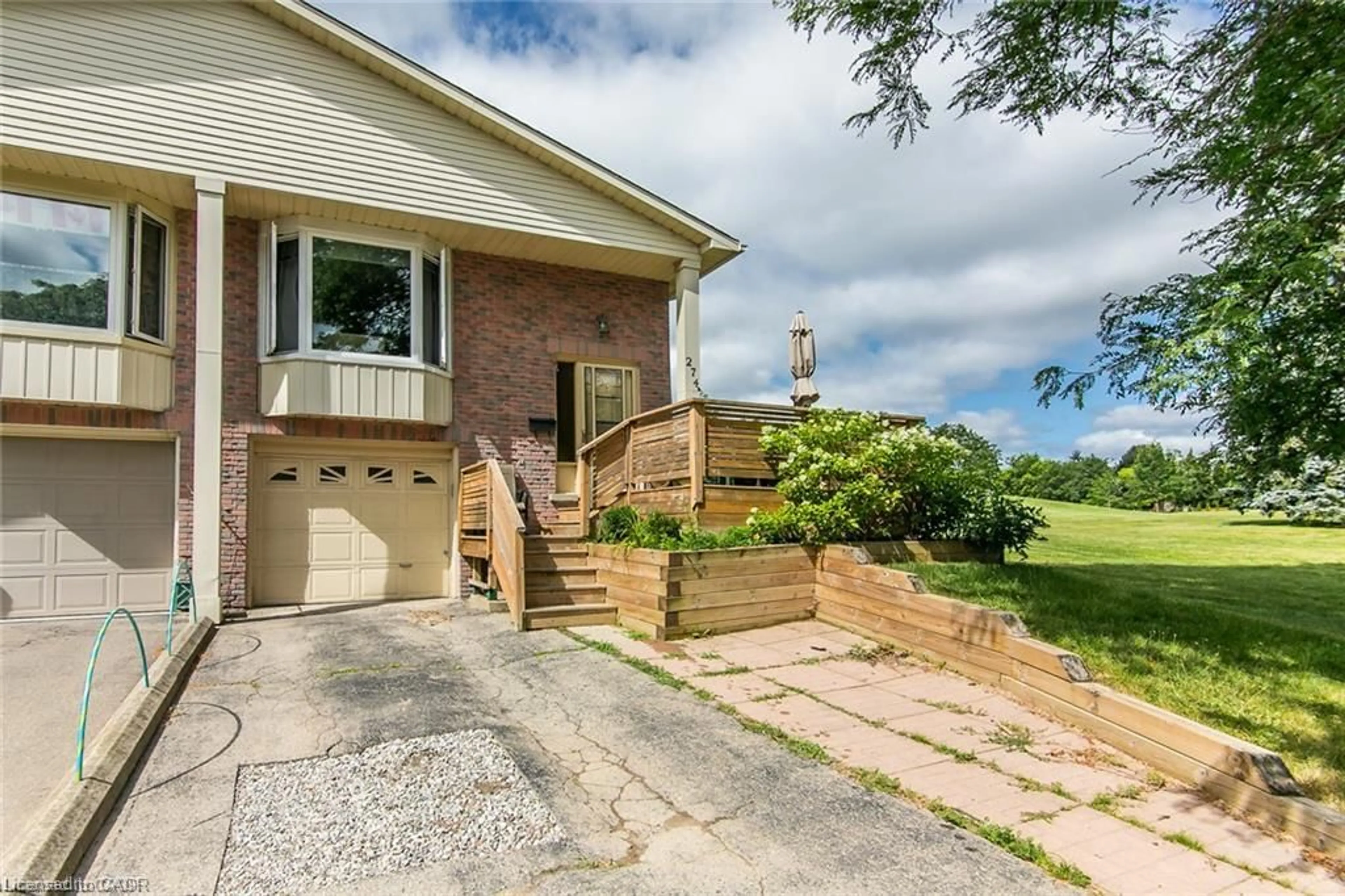 Home with brick exterior material, street for 274 Northlake Dr #B, Waterloo Ontario N2V 1A9