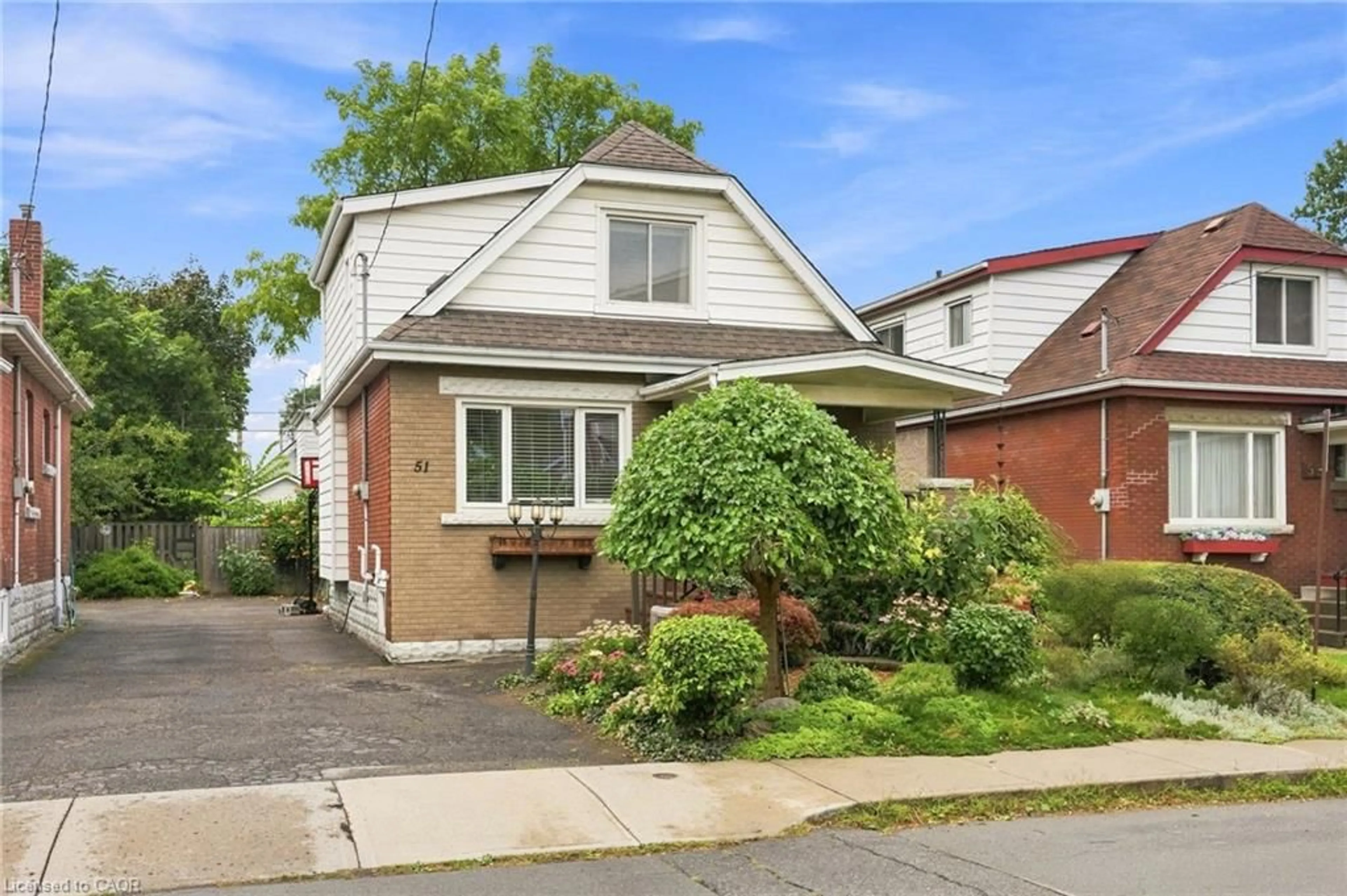Home with brick exterior material, street for 51 Barons Ave, Hamilton Ontario L8H 5A3