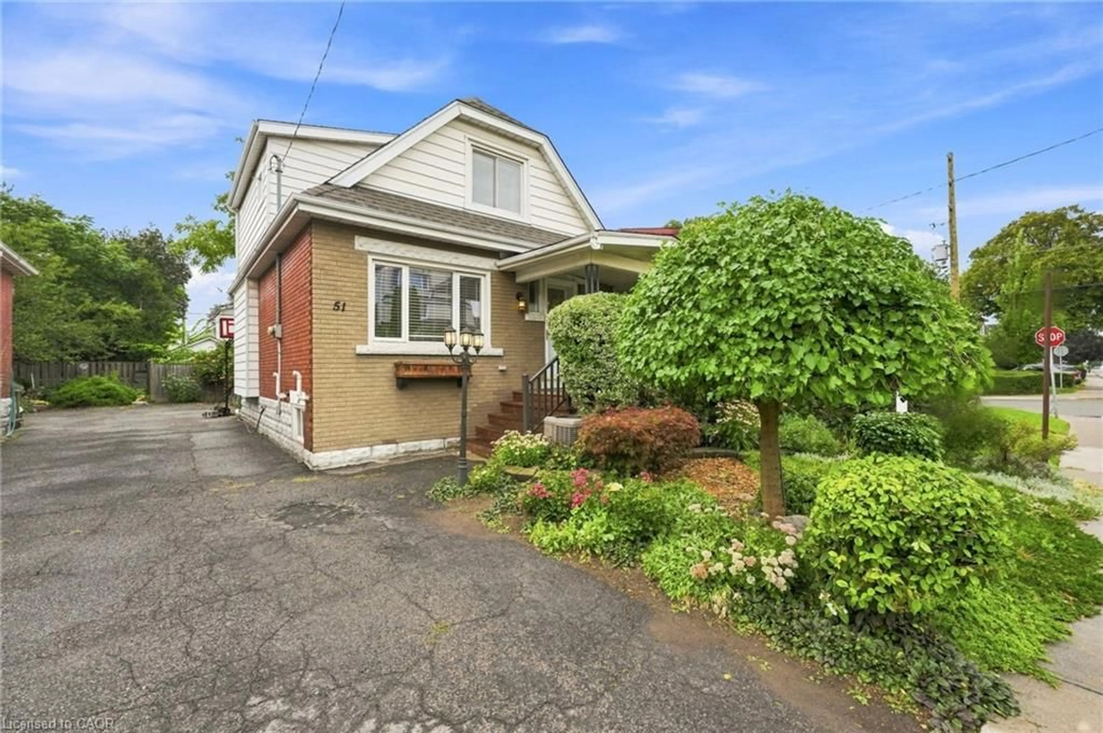 Home with brick exterior material, street for 51 Barons Ave, Hamilton Ontario L8H 5A3