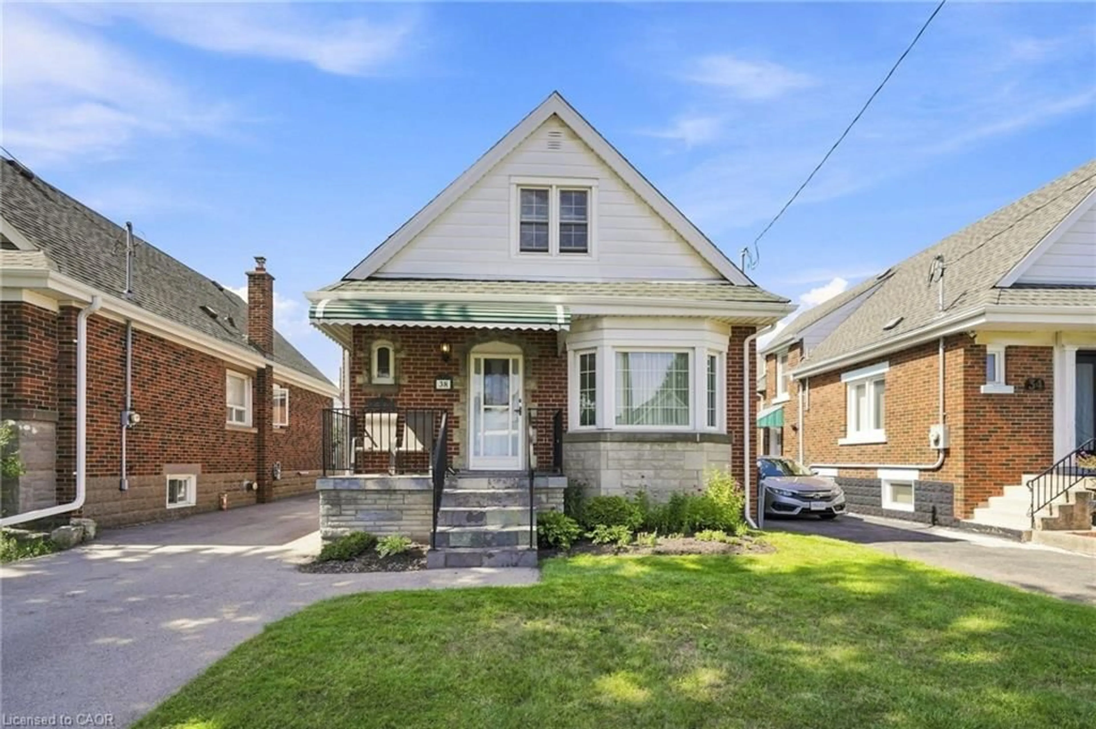 Home with brick exterior material, street for 38 Garside Ave, Hamilton Ontario L8K 2V6