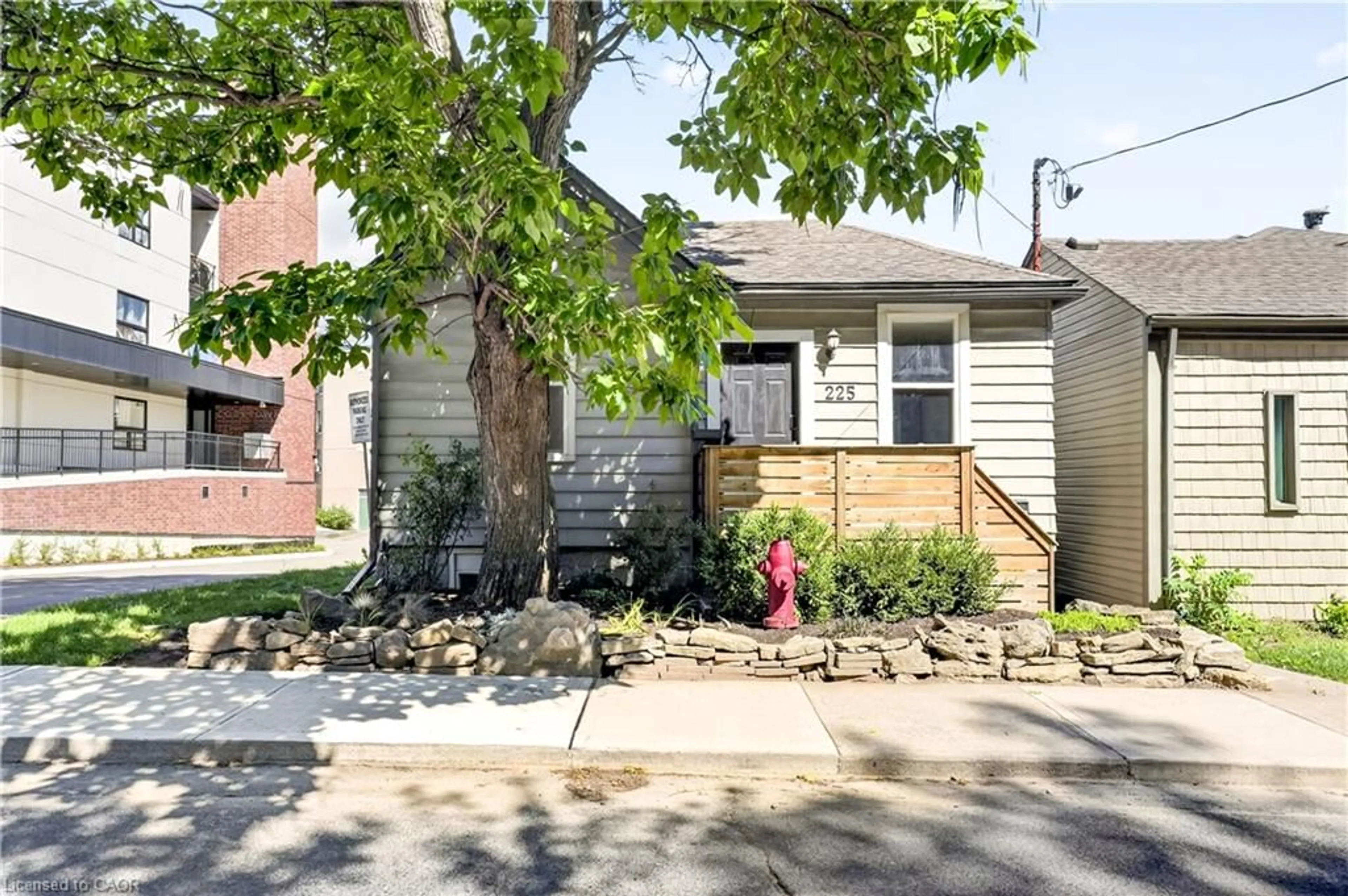 Home with brick exterior material, street for 225 Charlton Ave, Hamilton Ontario L8N 1Z2