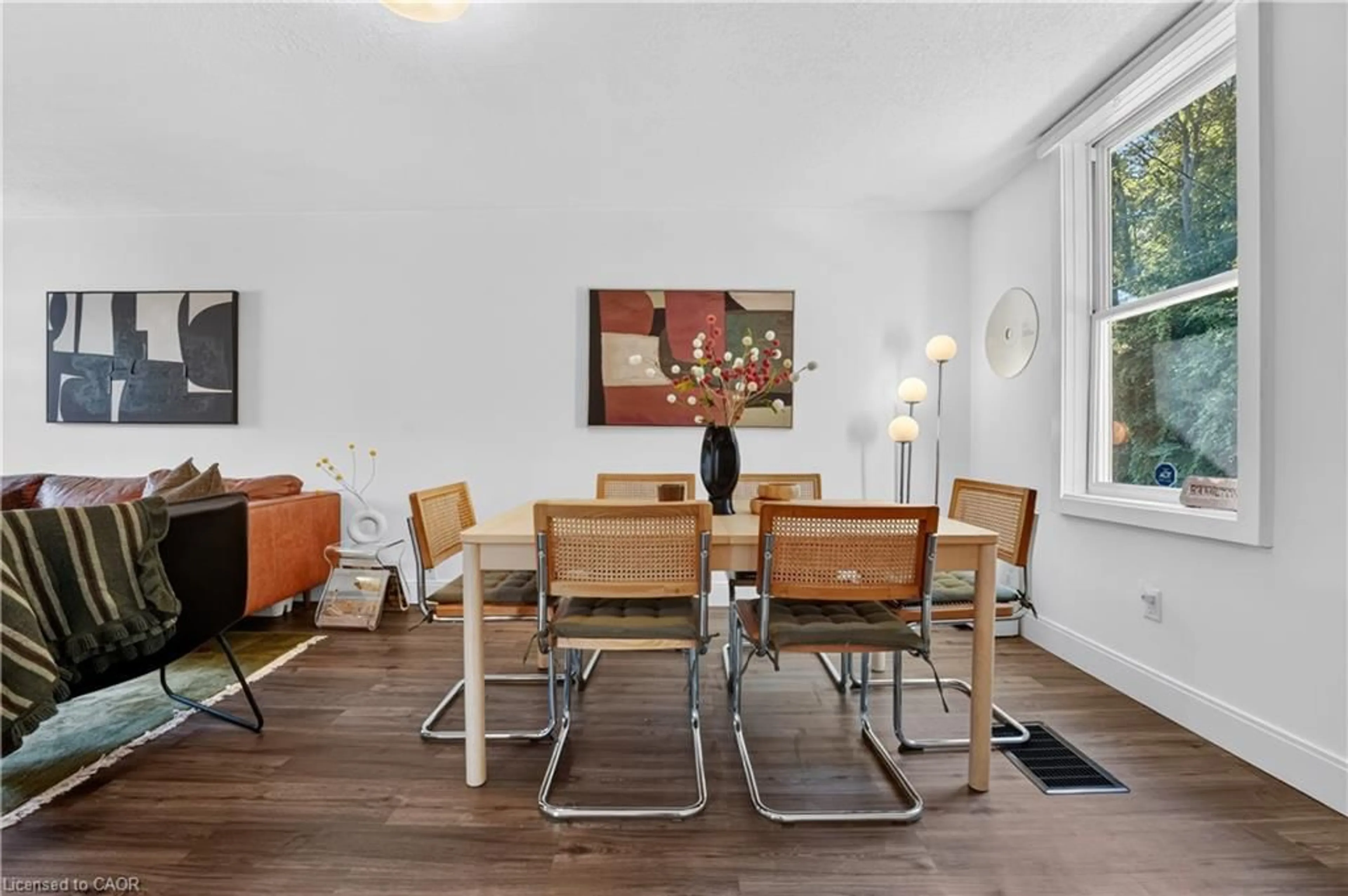 Dining room, wood/laminate floor for 225 Charlton Ave, Hamilton Ontario L8N 1Z2