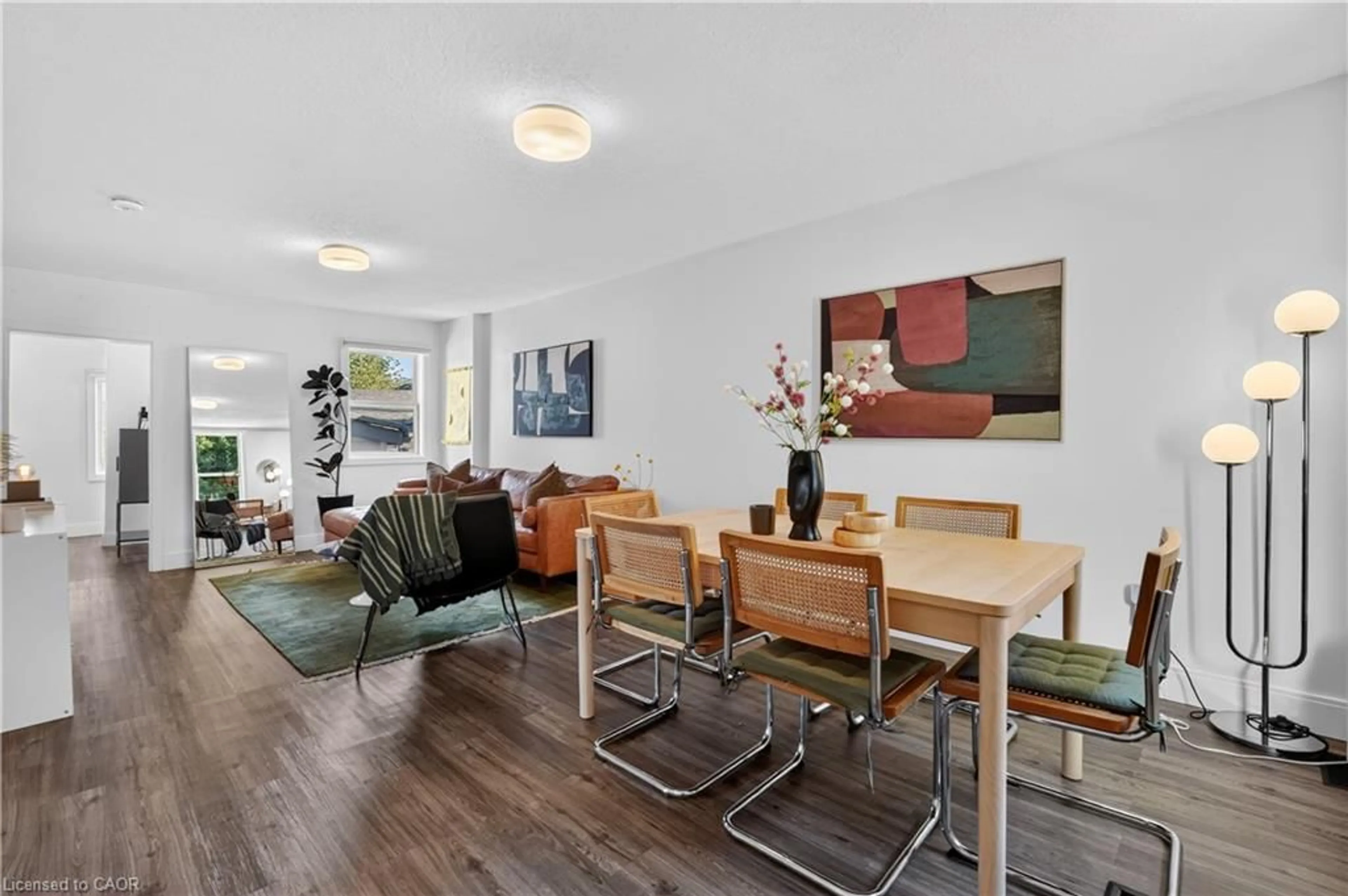 Dining room, wood/laminate floor for 225 Charlton Ave, Hamilton Ontario L8N 1Z2