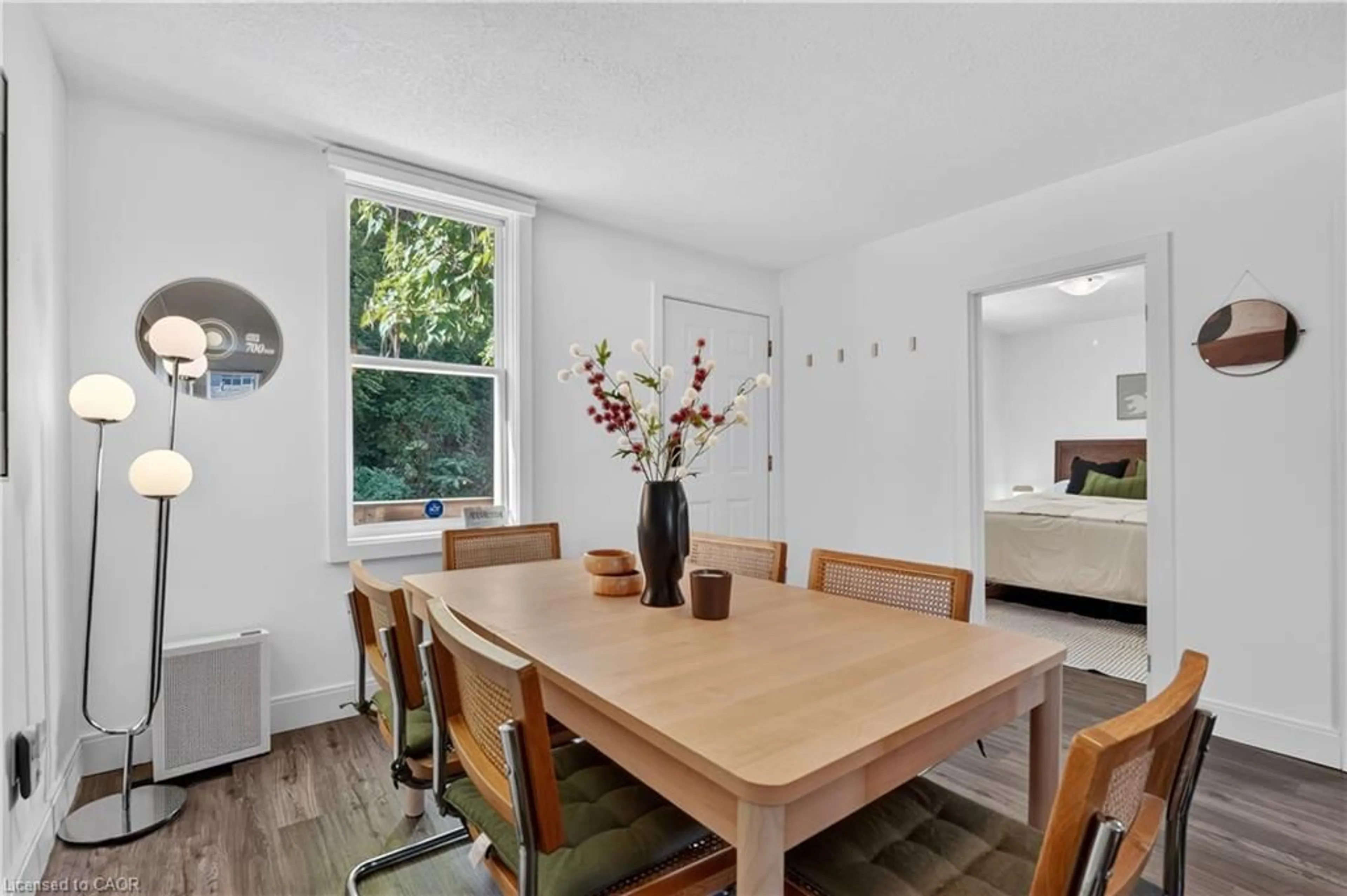 Dining room, wood/laminate floor for 225 Charlton Ave, Hamilton Ontario L8N 1Z2