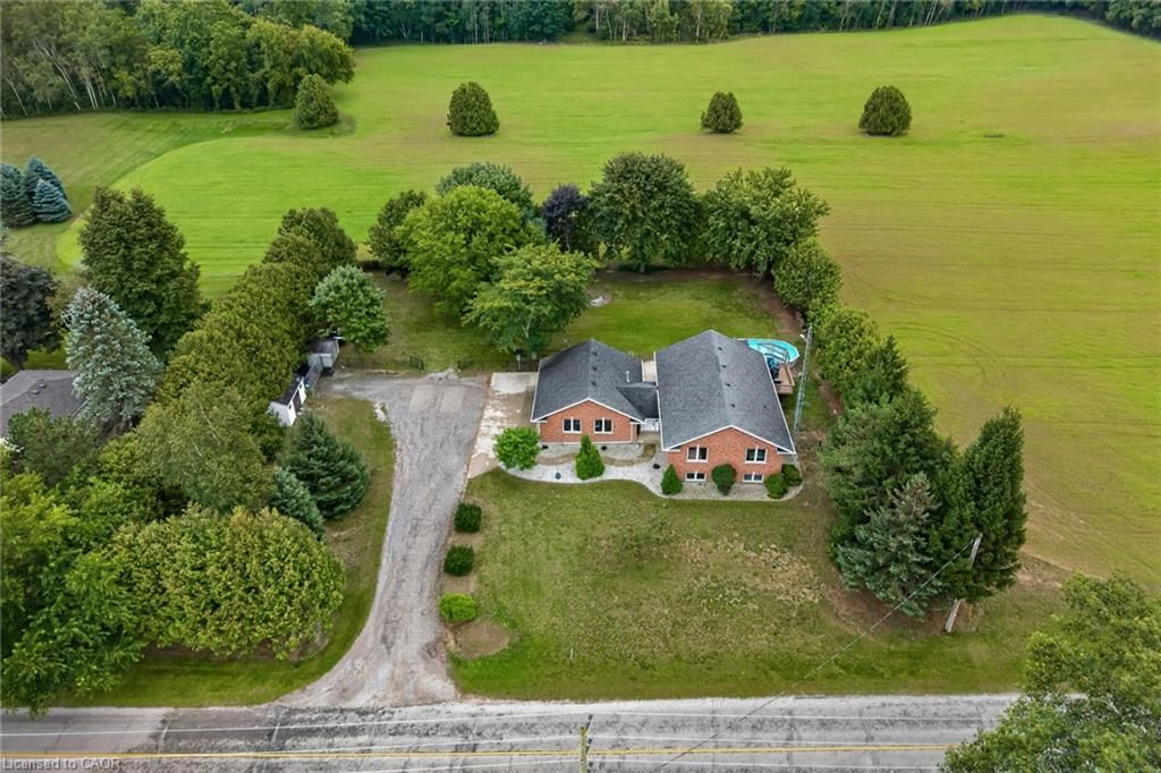 A pic from outside/outdoor area/front of a property/back of a property/a pic from drone, unknown for 1370 Windham 11 Rd, Lynnville Ontario N0E 2A0
