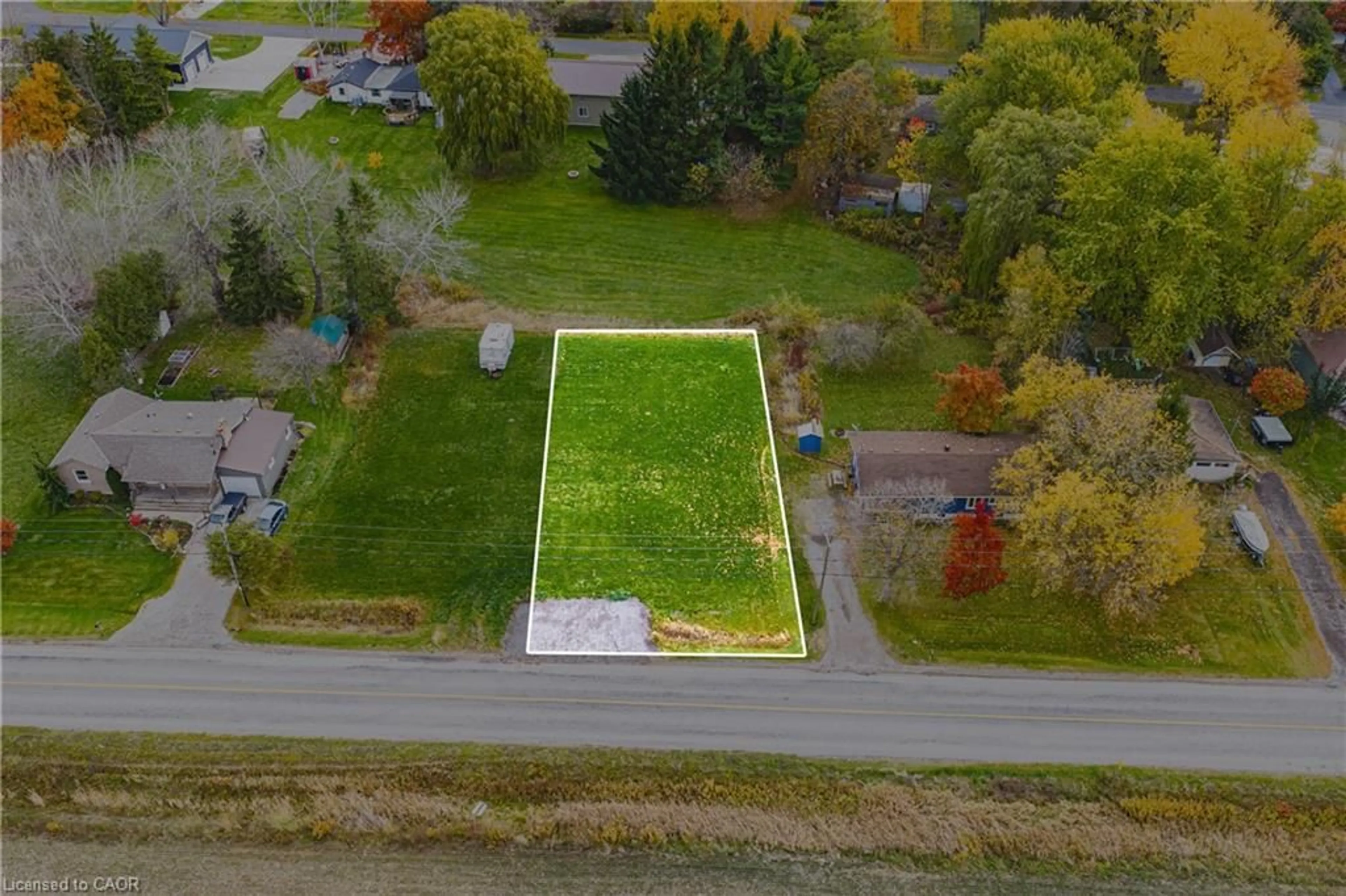 A pic from outside/outdoor area/front of a property/back of a property/a pic from drone, street for 610 New Lakeshore Rd, Port Dover Ontario N0A 1N3