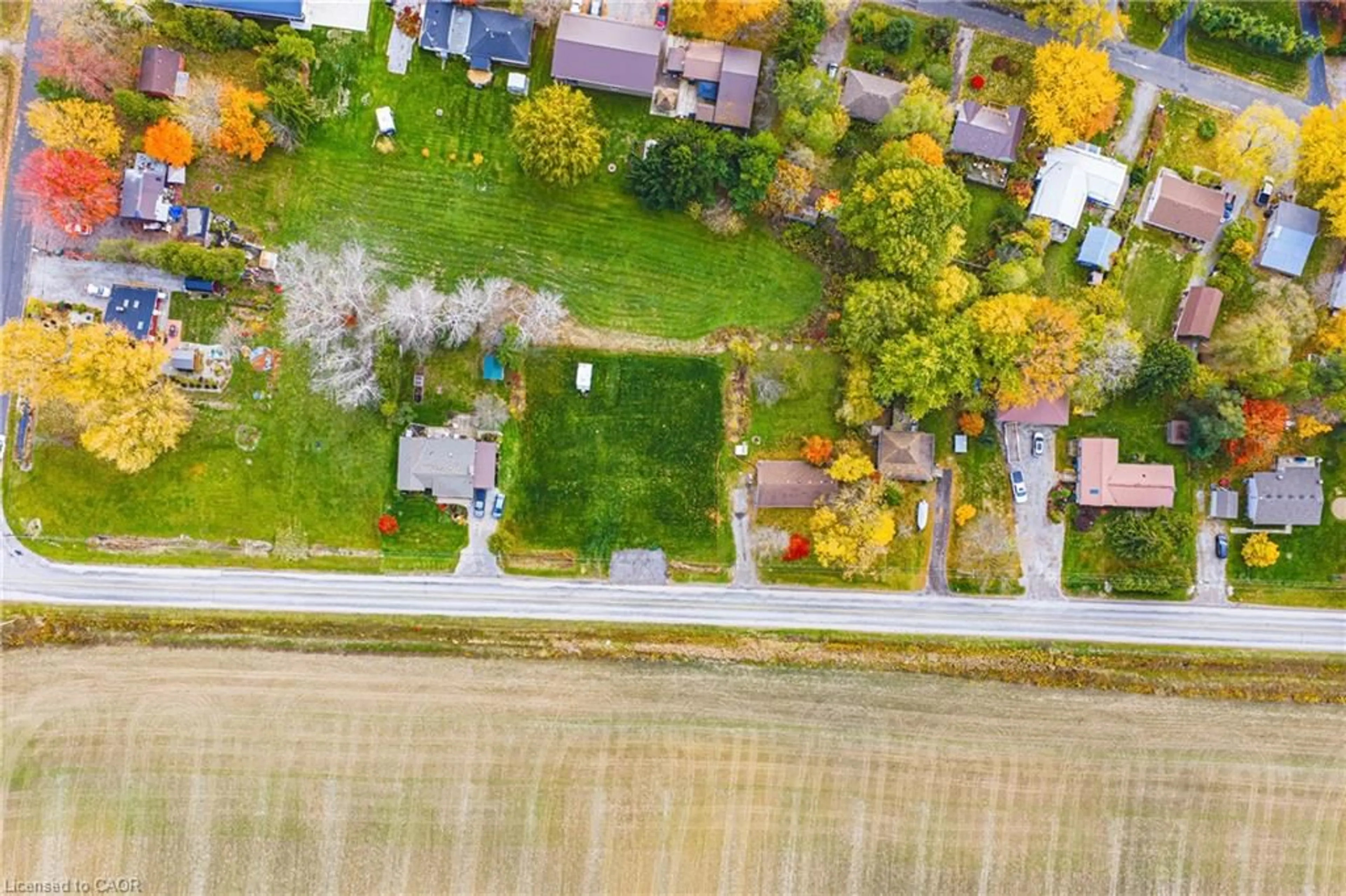A pic from outside/outdoor area/front of a property/back of a property/a pic from drone, street for 610 New Lakeshore Rd, Port Dover Ontario N0A 1N3
