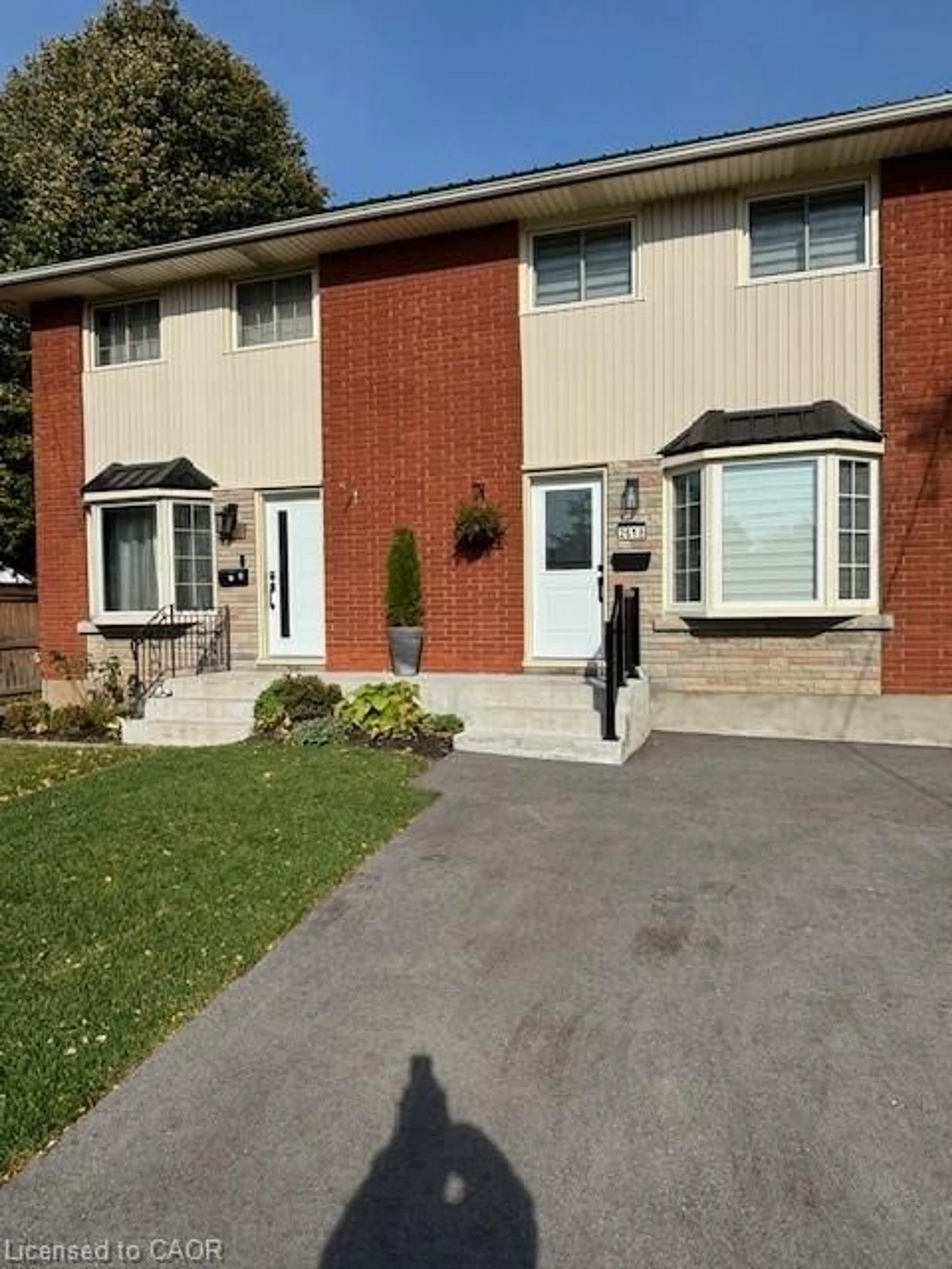 Home with brick exterior material, street for 261 Scott St #B, St. Catharines Ontario L2N 1H9