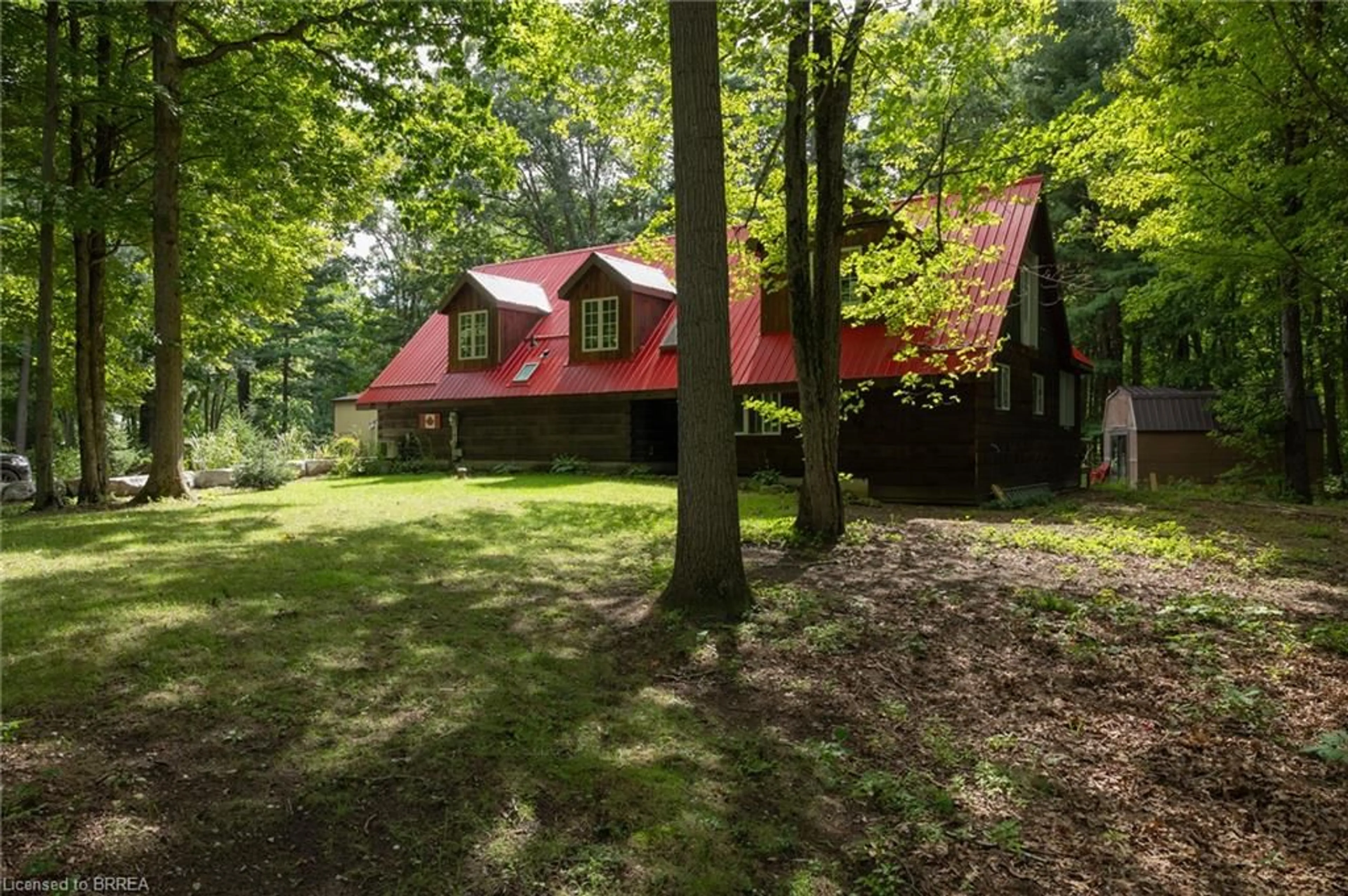 A pic from outside/outdoor area/front of a property/back of a property/a pic from drone, forest/trees view for 2605 Windham East Quarter Line Rd, Vanessa Ontario N0E 1V0
