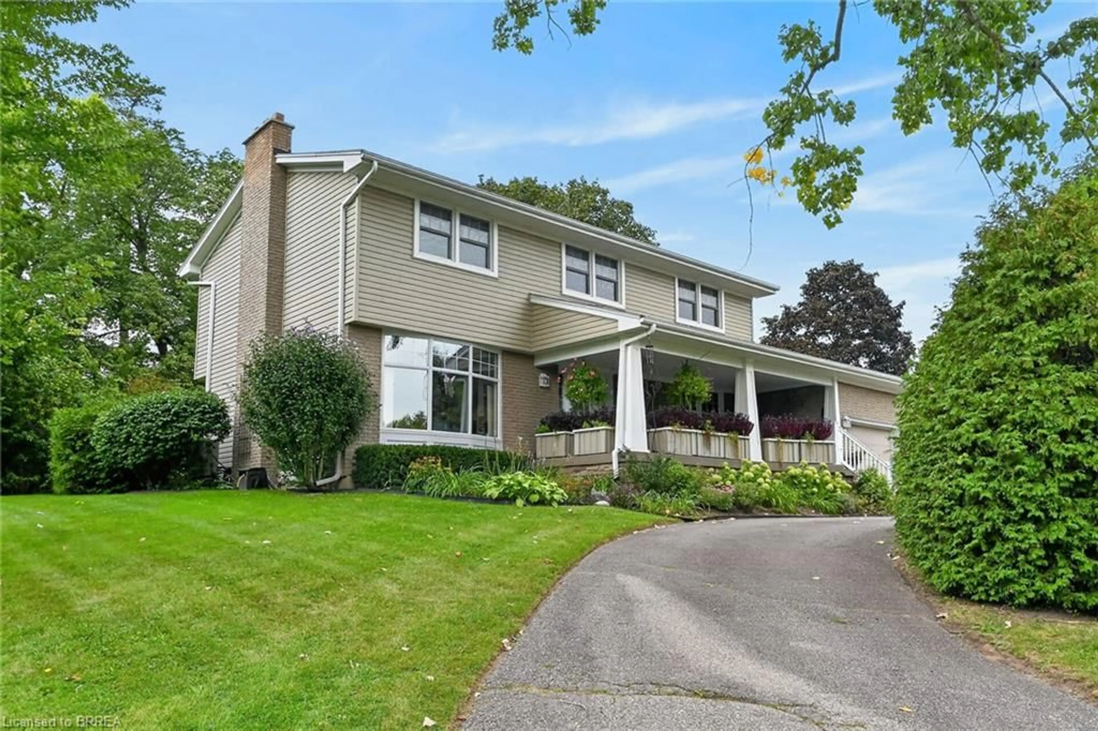Home with vinyl exterior material, street for 4 Gaywood Gdns, Brantford Ontario N3T 5J8