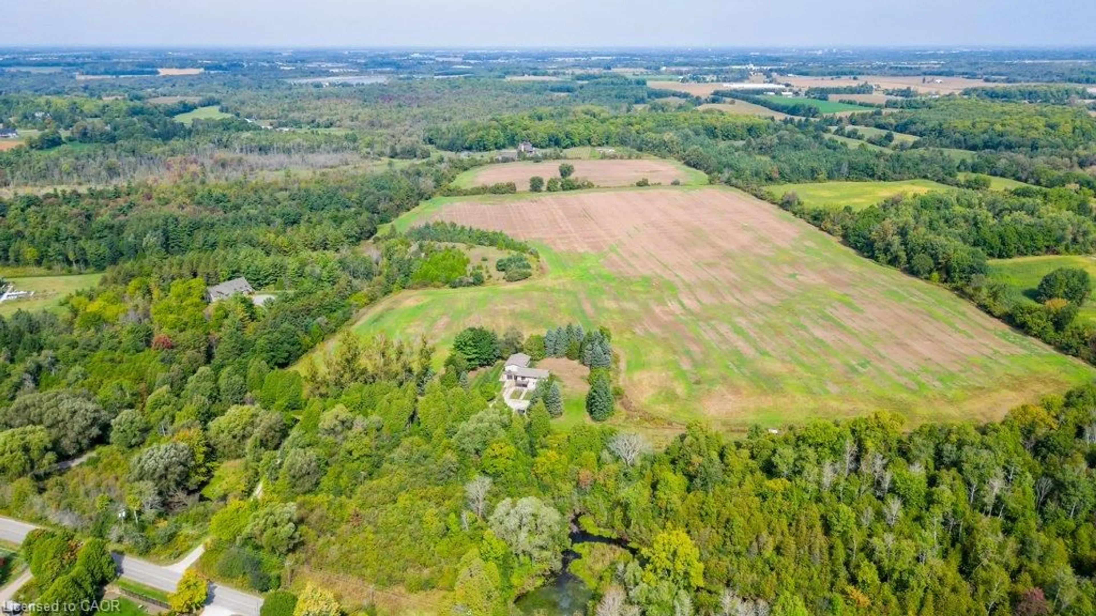 A pic from outside/outdoor area/front of a property/back of a property/a pic from drone, forest/trees view for 6542 Ellis Rd, Cambridge Ontario N3C 2V4
