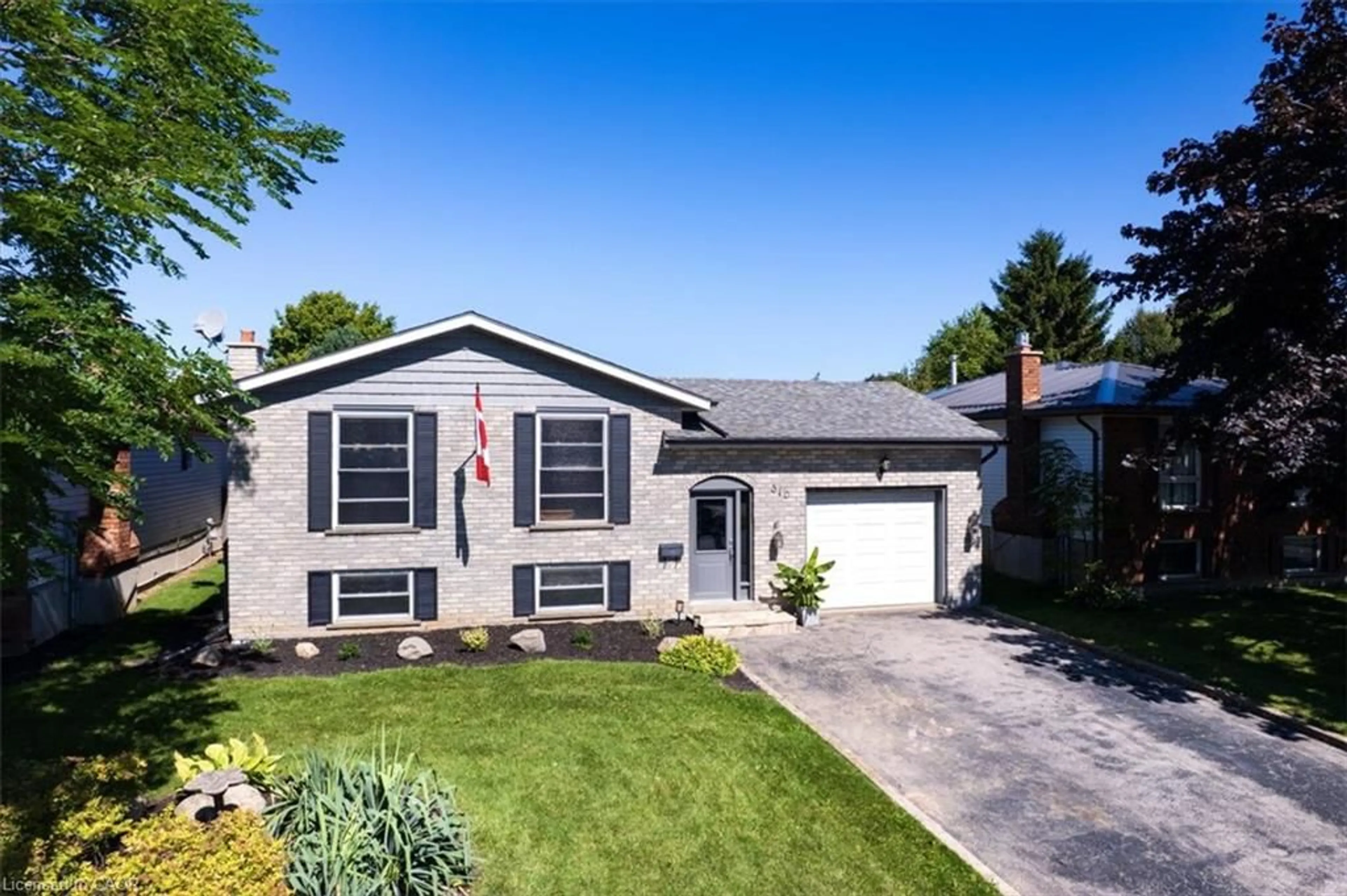 Home with vinyl exterior material, street for 310 Dover Ave, Port Dover Ontario N0A 1N4