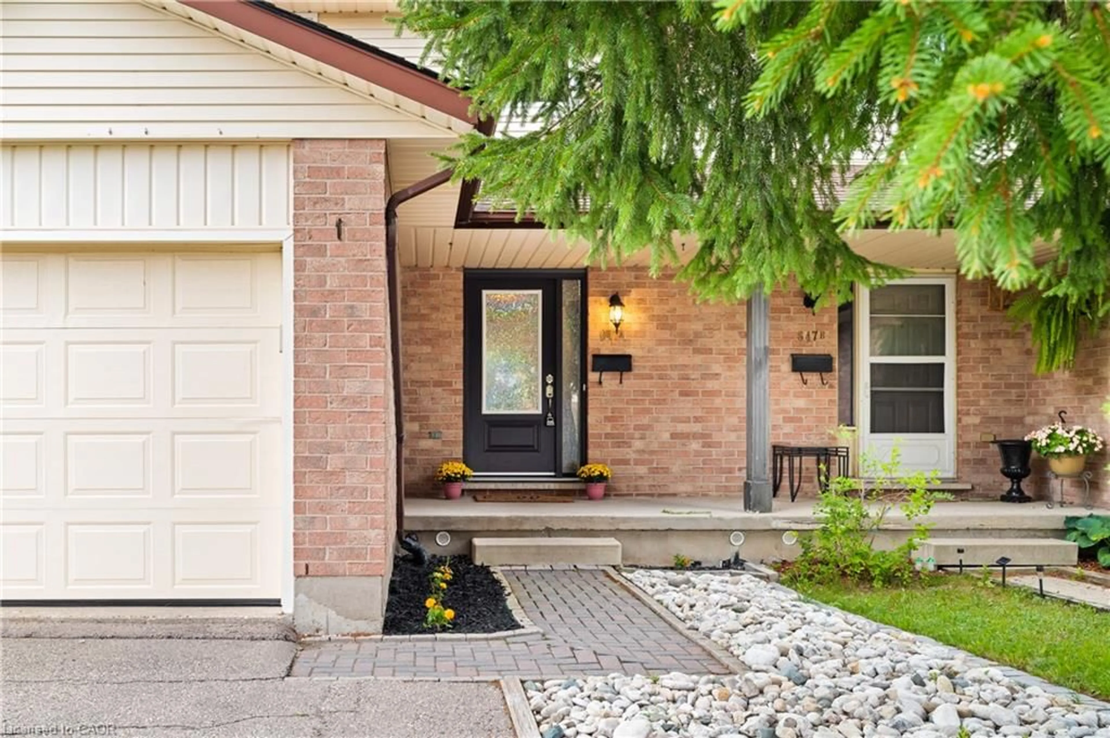 Home with brick exterior material, street for 647 Pinerow Cres #A, Waterloo Ontario N2T 2K5