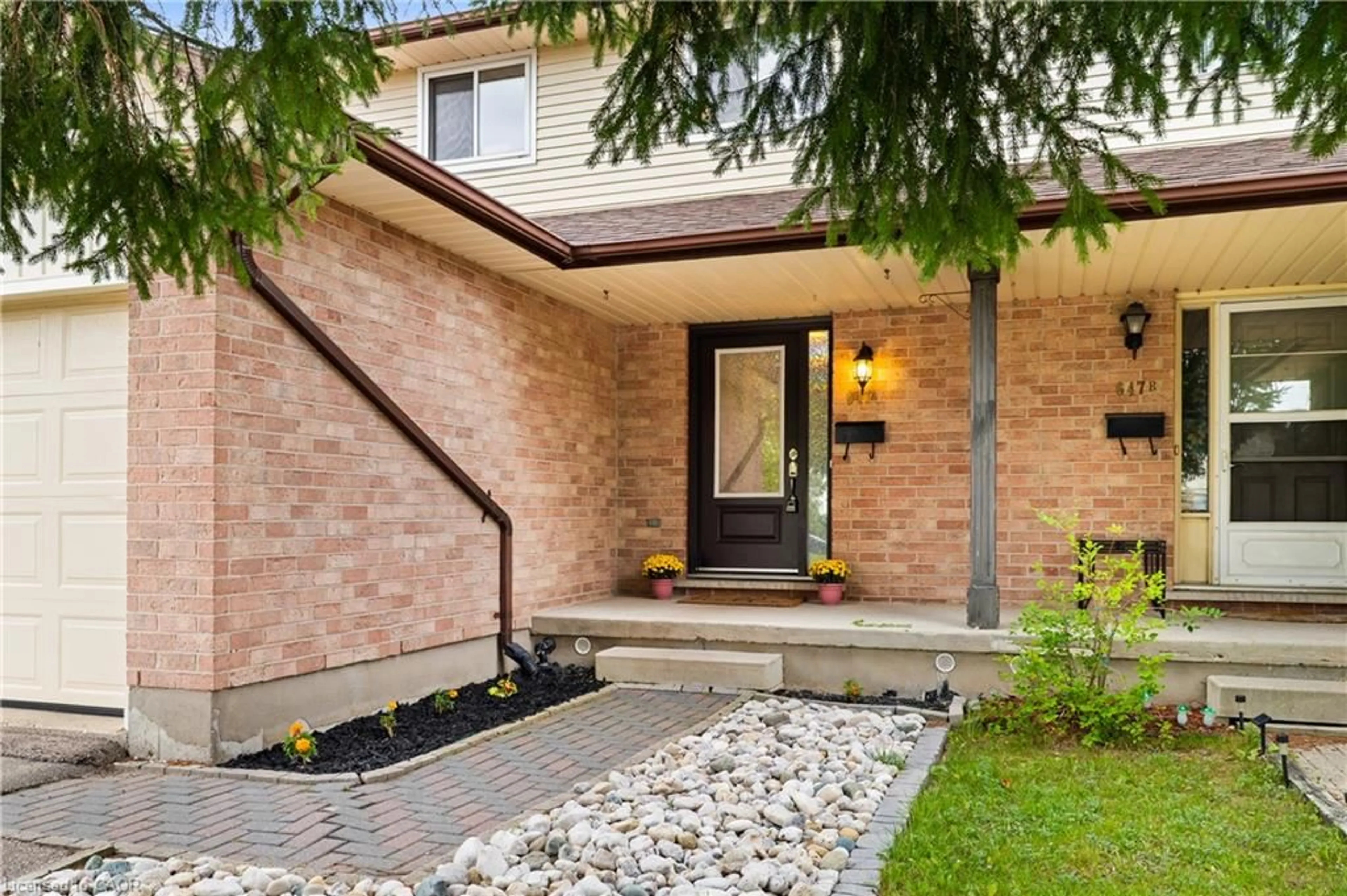 Home with brick exterior material, street for 647 Pinerow Cres #A, Waterloo Ontario N2T 2K5