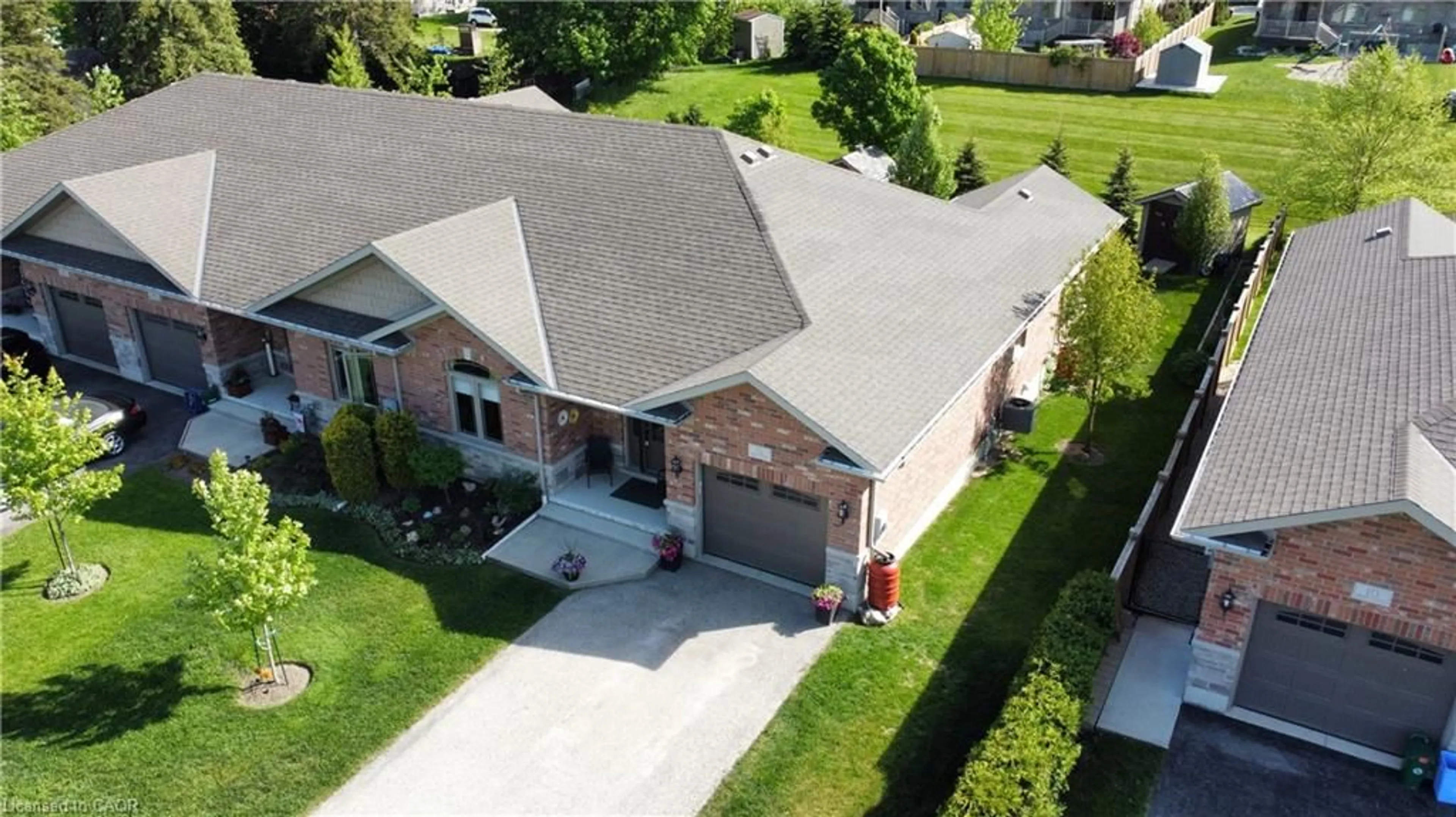 A pic from outside/outdoor area/front of a property/back of a property/a pic from drone, street for 12 Brown St, Minto Ontario N0G 1M0